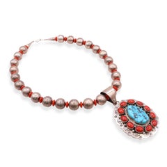 Collana vintage H. Begay Navajo con ciondolo in argento sterling, turchese e corallo