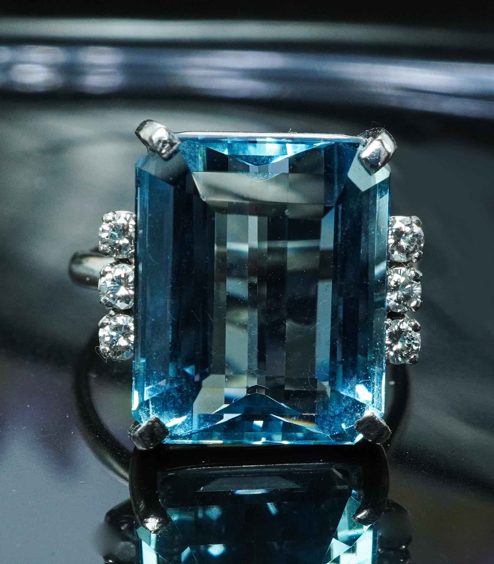 Vintage H Stern 15ct Emerald cut Aquamarine Diamond Ring 18K White Gold Designer Signed

This is vintage estate treasure crafted in rich 18K white gold. It is hallmarked by H Stern (see picture). The genuine earth mined vibrant aquamarine measures