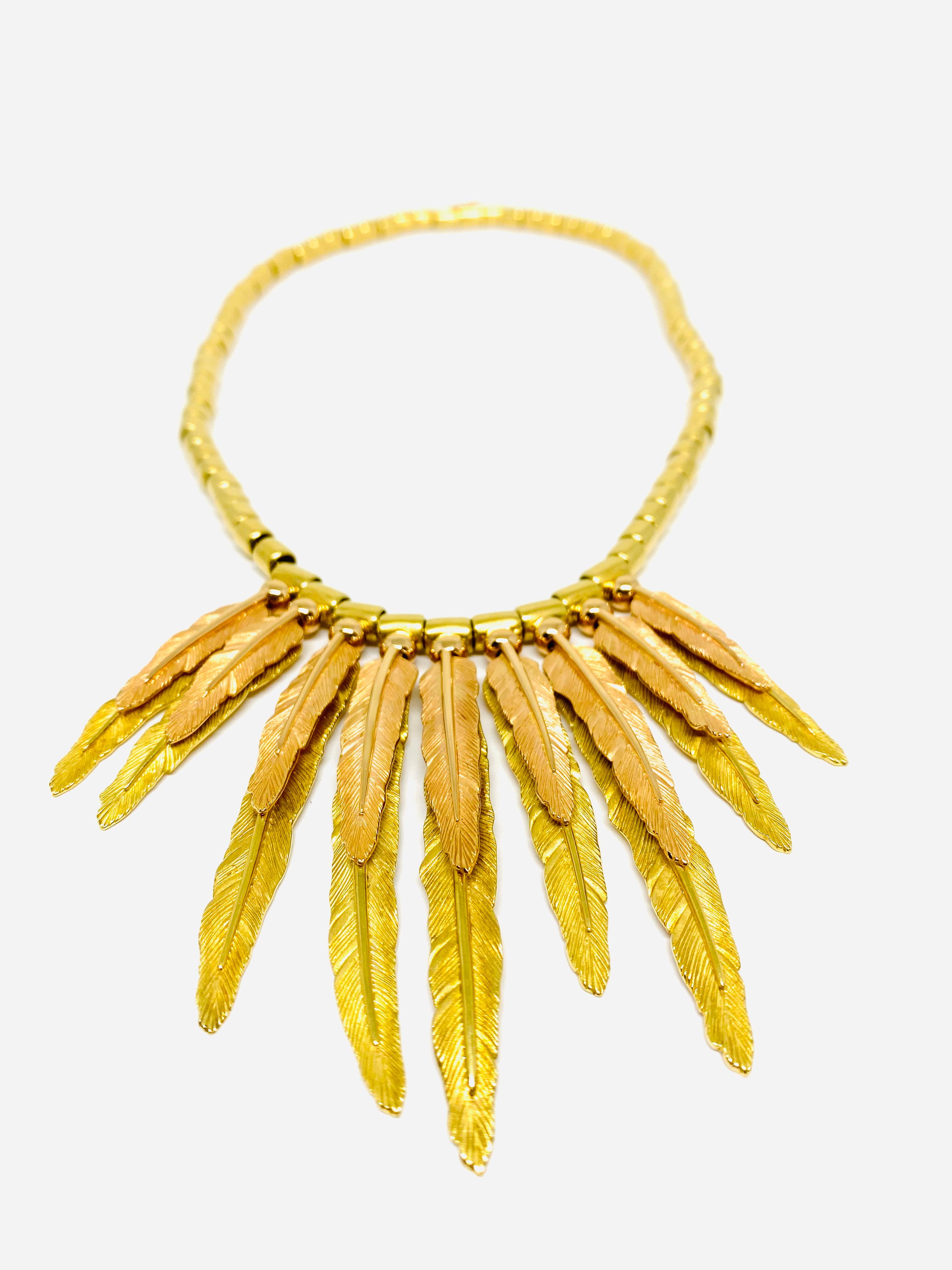 Vintage H. Stern 18K Yellow Gold Bead Necklace w/ Feather Leaves Pendant

Product details:
18K yellow gold round square beads necklace, each bead is approx. 6mm (0.25”)
18K yellow and rose gold nine detailed carved leaves/ feather pendants, measure