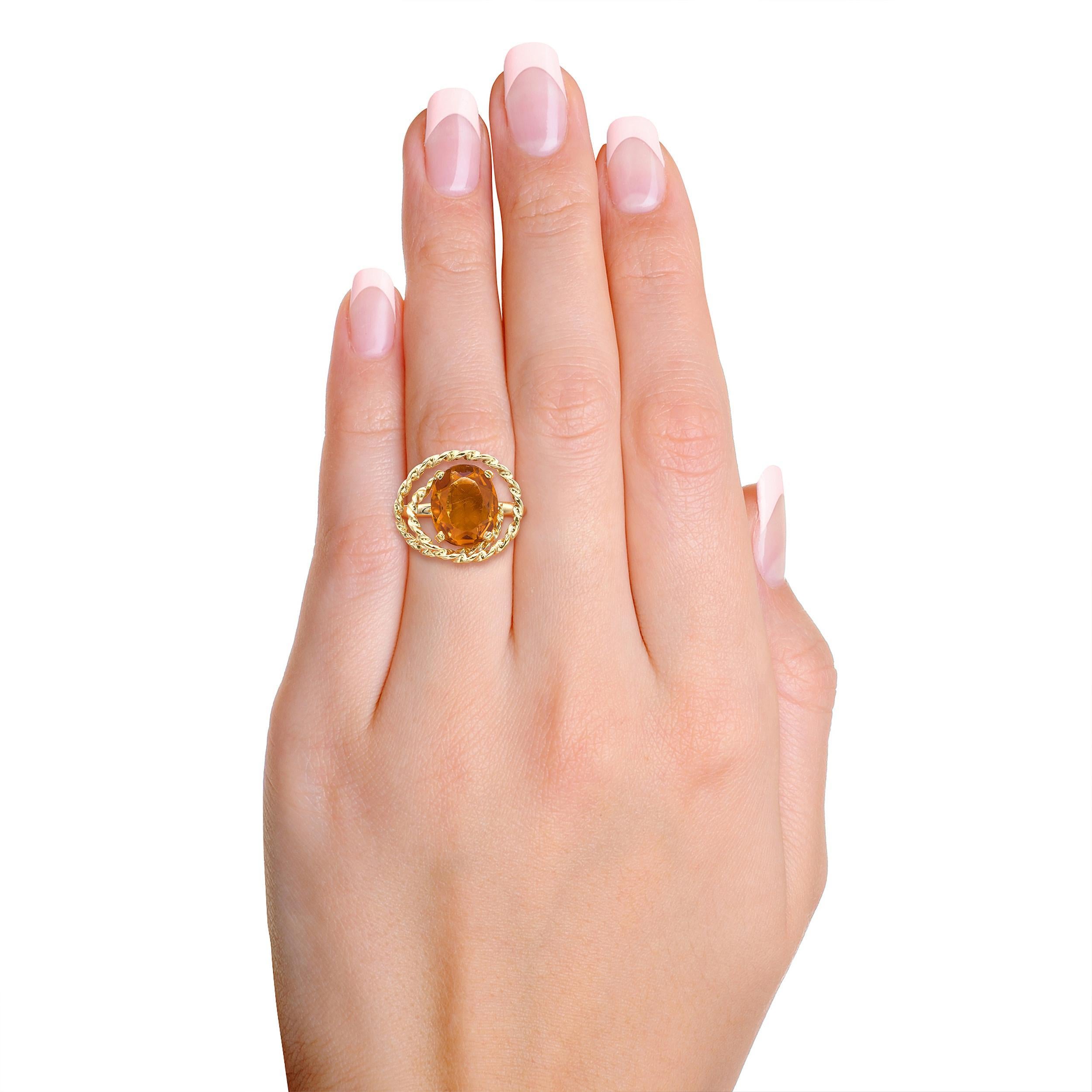 Anillo vintage H. Stern de oro amarillo de 18 quilates con citrino y diseño de cuerda enrollada Corte oval en venta
