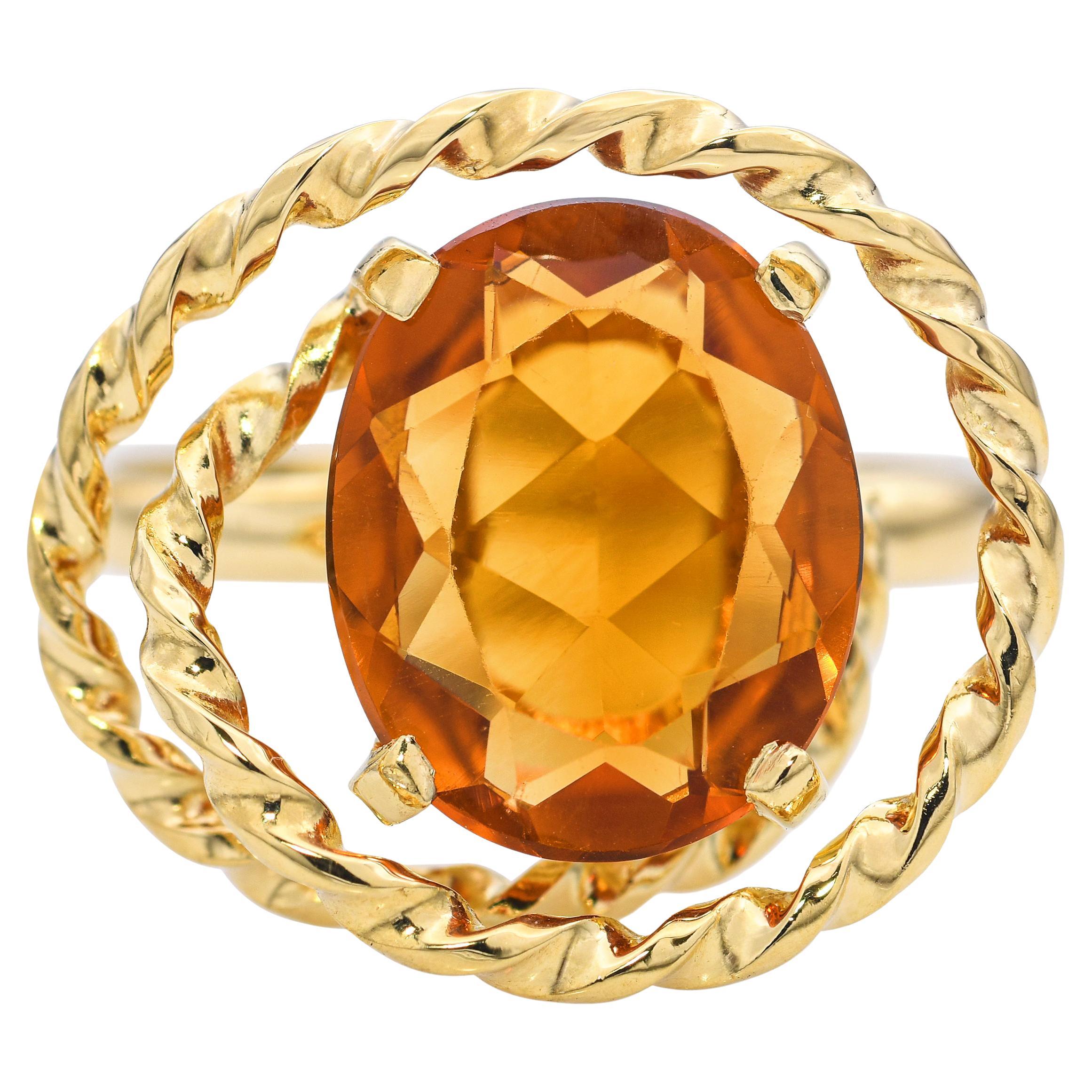Anillo vintage H. Stern de oro amarillo de 18 quilates con citrino y diseño de cuerda enrollada en venta