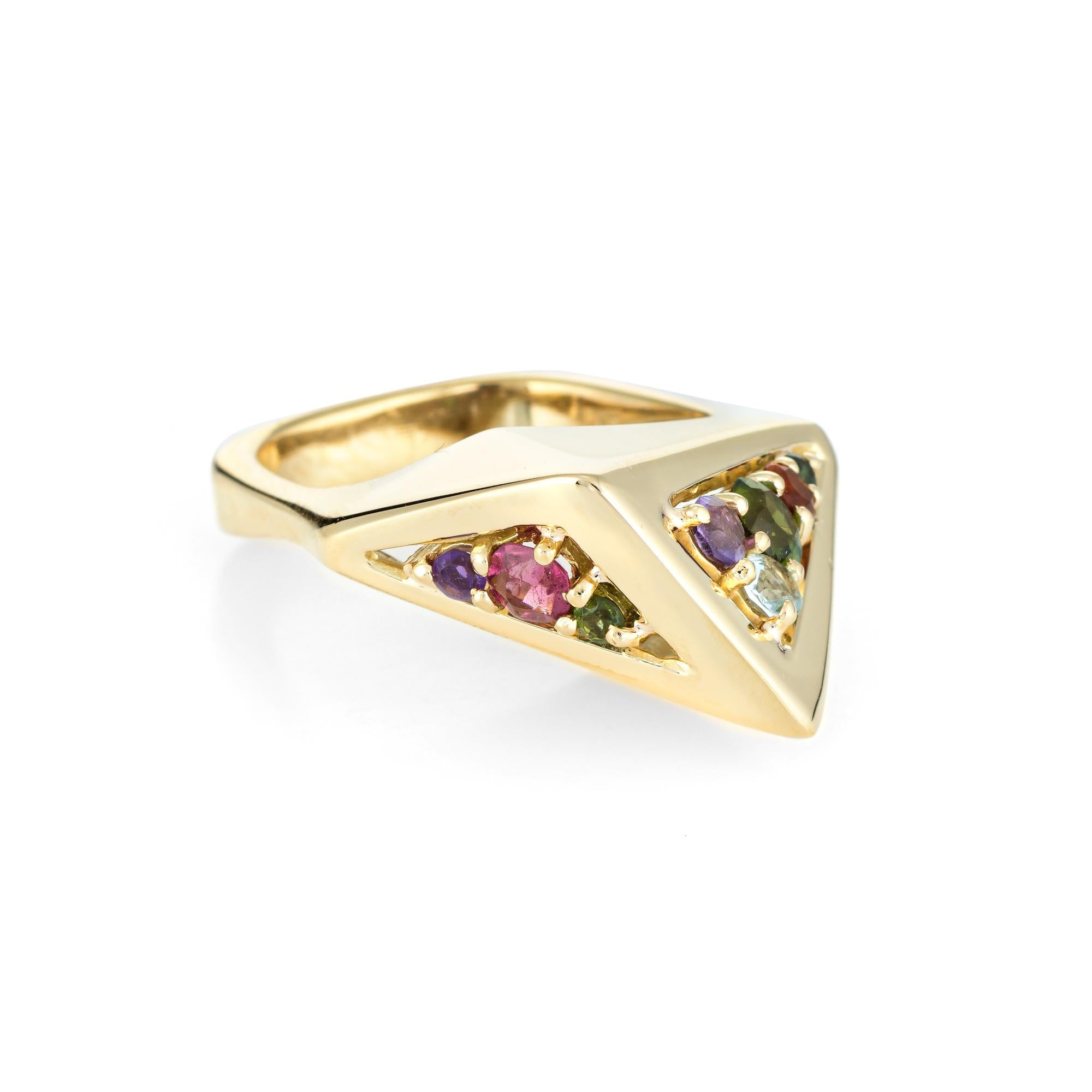 Distinct H Stern geometric multi colored gemstone cocktail ring (circa 1980s), crafted in 18 karat yellow gold. 

Semi-precious gemstones (aquamarine, amethyst, pink & green tourmaline & citrine) are cut in various sizes from 0.05 to 0.20 carats and