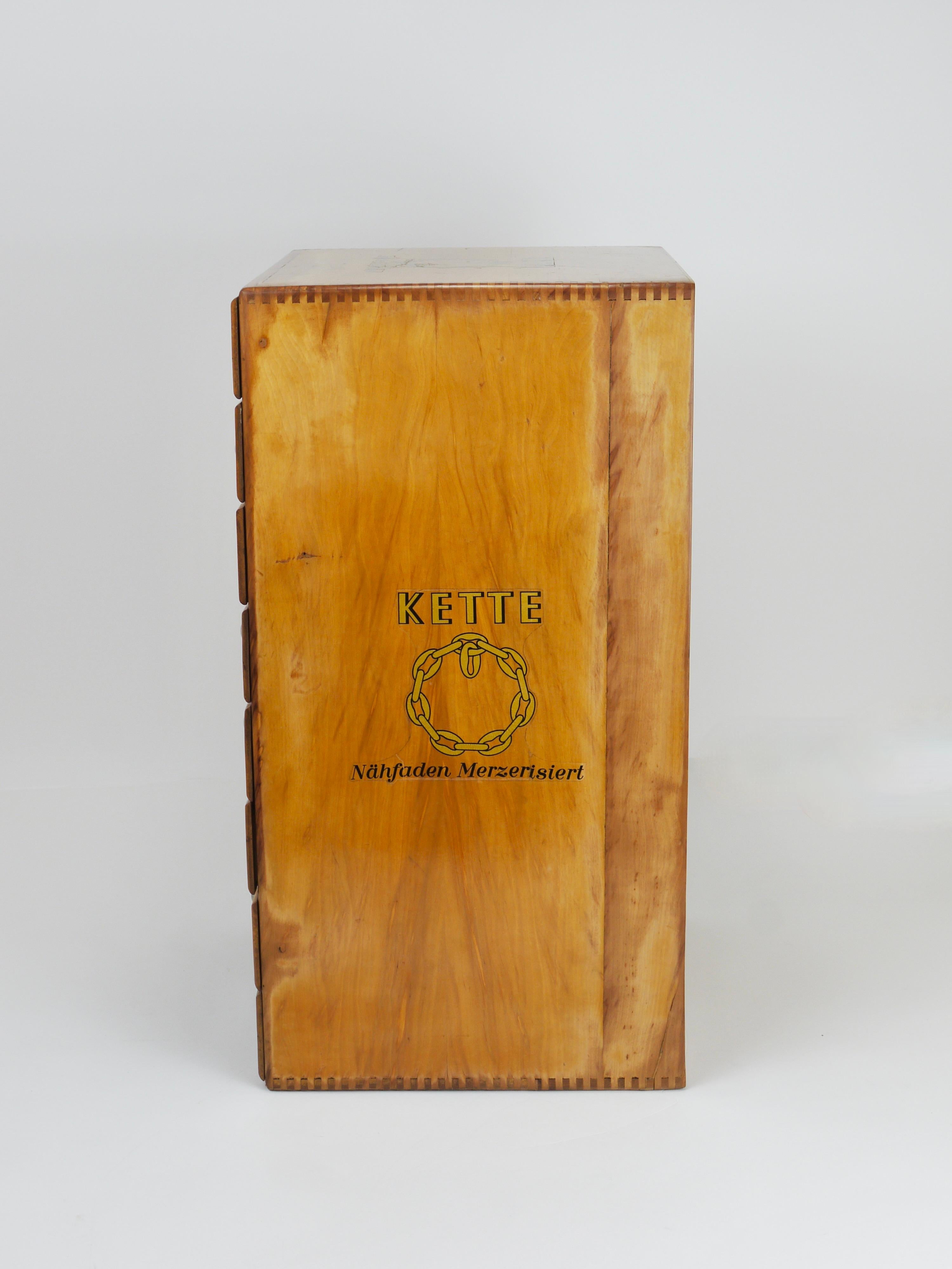 Metà XX secolo Armadietto in legno per merceria d'epoca, Kette, Austria, anni '30 in vendita
