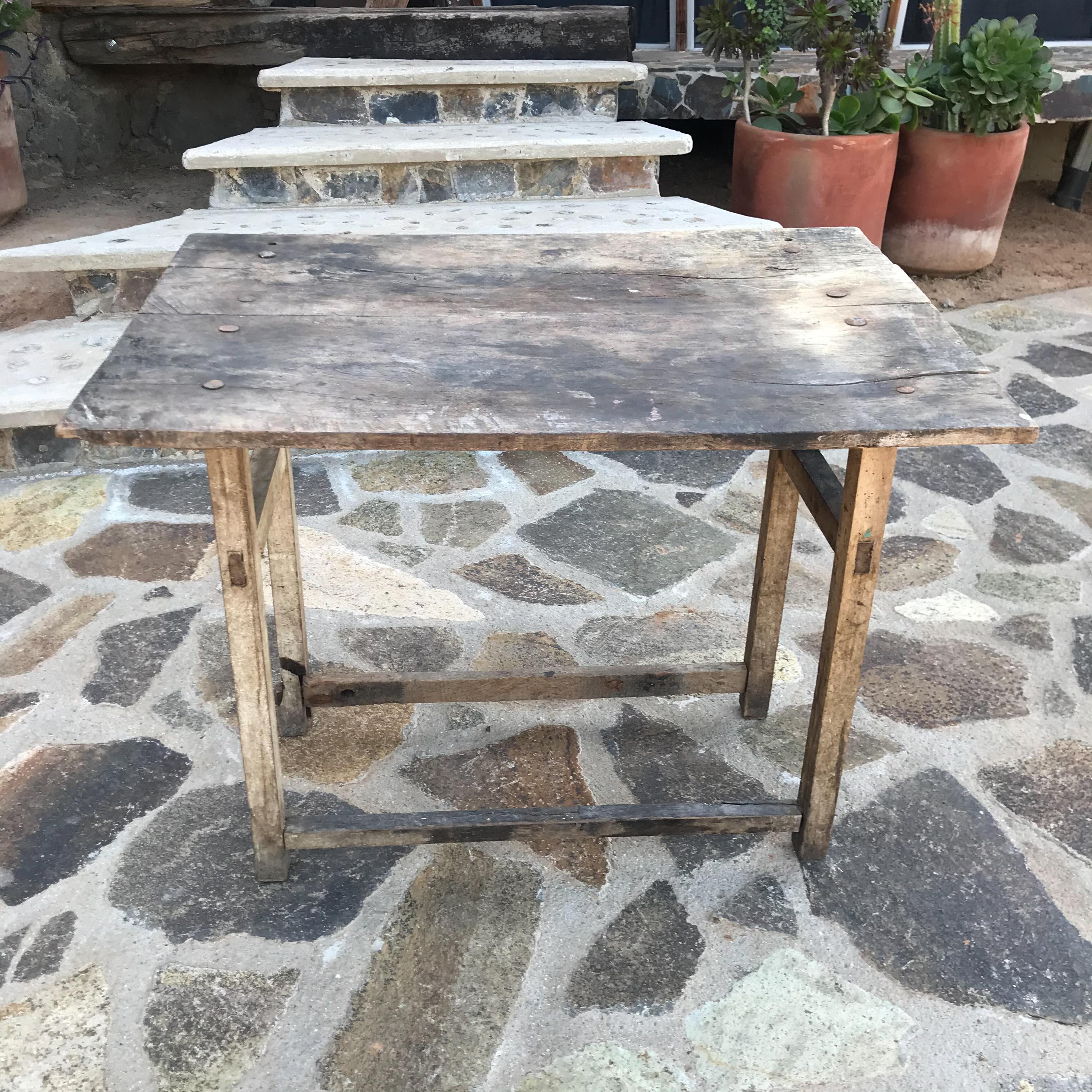 Vintage Hacienda Rustic Edge Mexican Mesquite Antique Wood Work Table
circa 1940s Mexico
30H x 26D x 38 W
Preowned original Vintage distressed condition Antique Unrestored
Refer to images provided.








