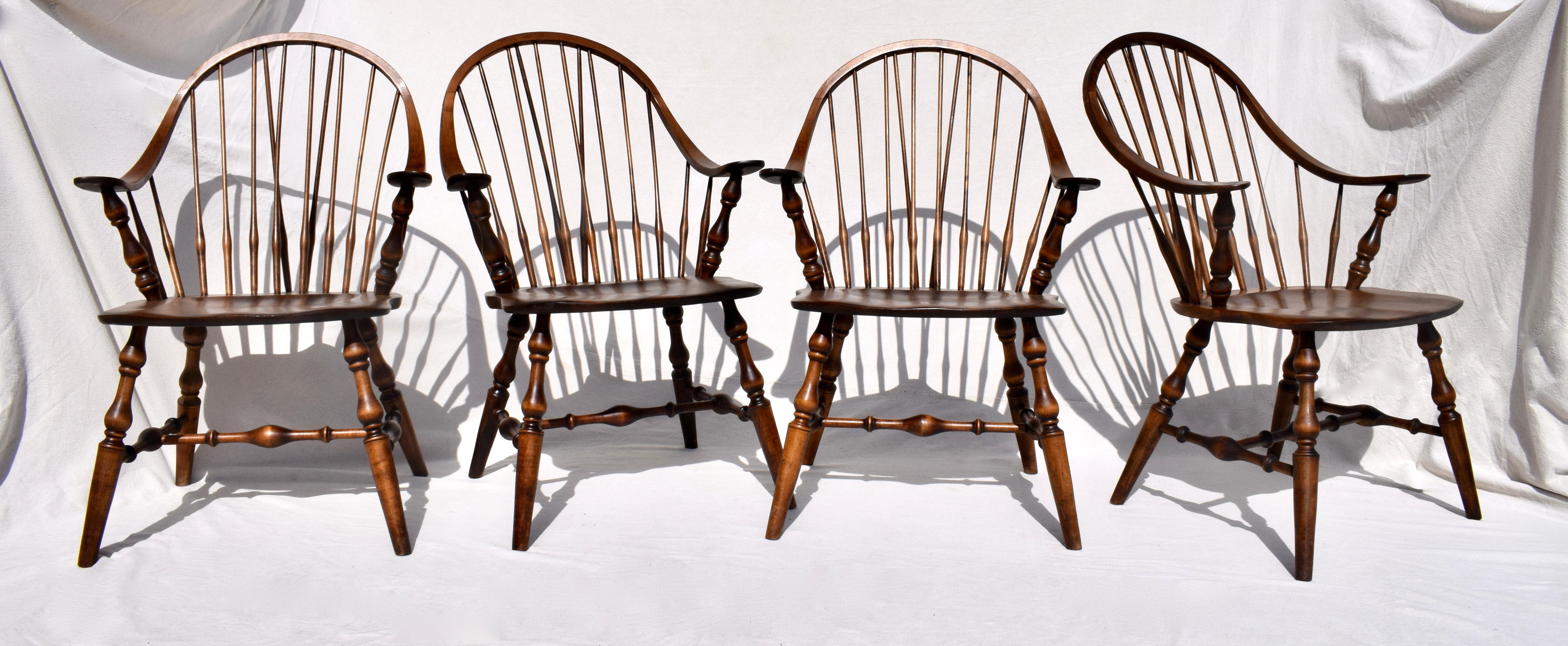 1950's Hale of Vermont Prospers continuous bow Windsor spindle back dining chairs of fine hand constructed dovetailing with Mortis & Tenon joinery. This scarcely seen set of four features interesting paddle like arms with turned legs & H stretcher