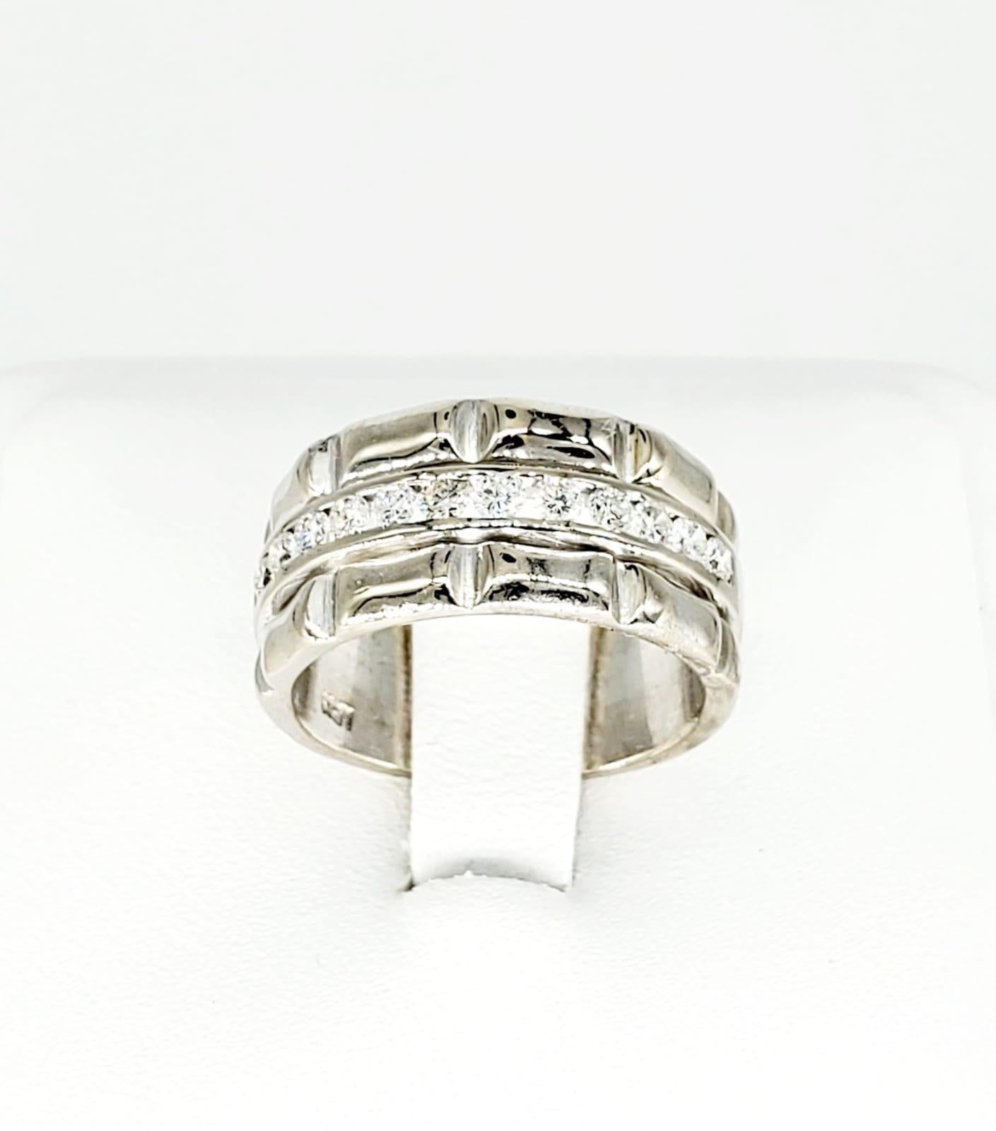 Vintage Half Eternity Diamond Band 18k White Gold Ring. The ring features approx 0.60 carat of diamonds and are of H/VS quality. The ring is made of 18k white gold and weights 9.5 grams. The ring is a size 5.5