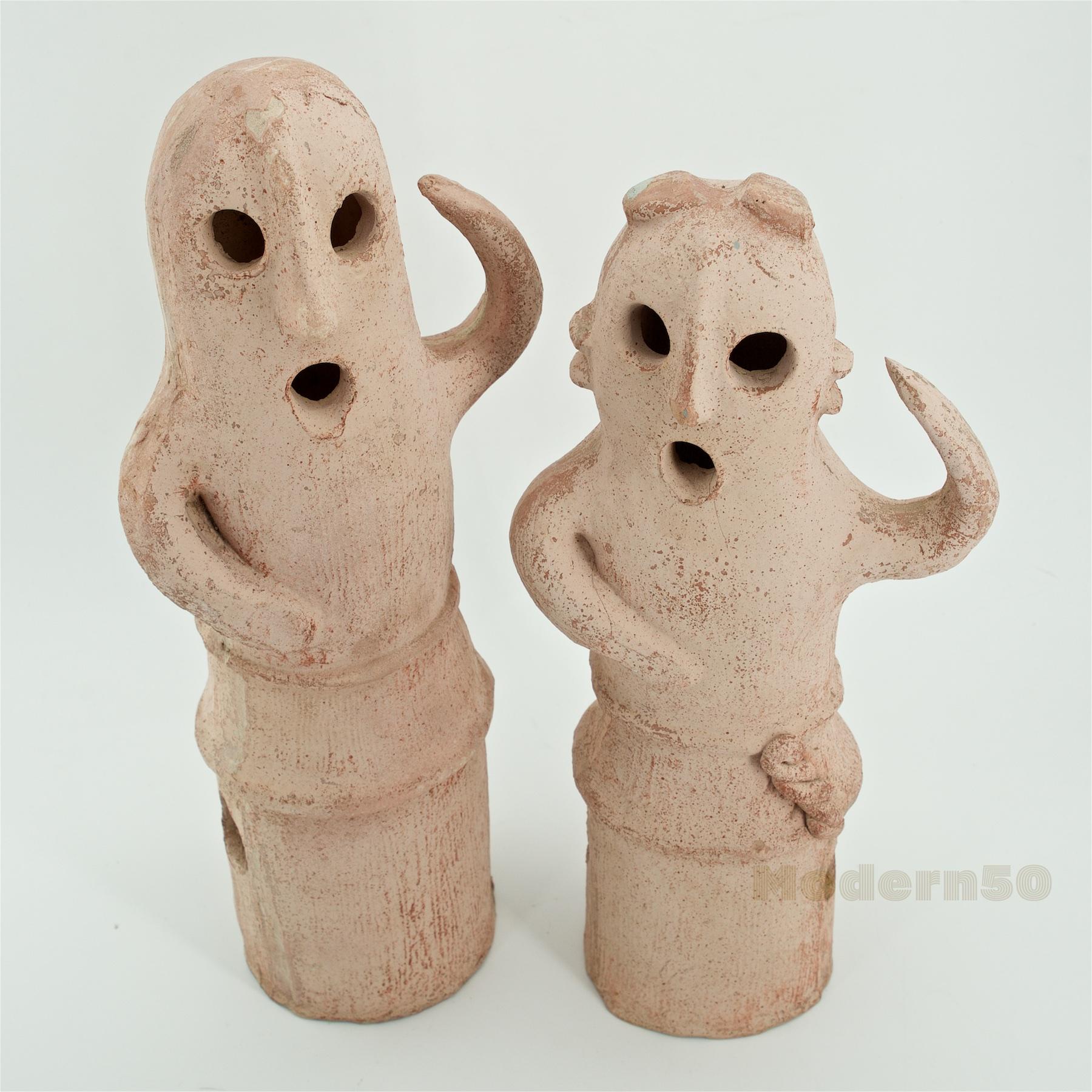 Mid-20th Century Replicas. Interesting ghost-like figural sculptures, of Man and Woman, 13 and 12 inches high.  Terracotta mixed with paper or paper clay, exact age unknown, procured from a time capsule estate. These sculptures are known as 