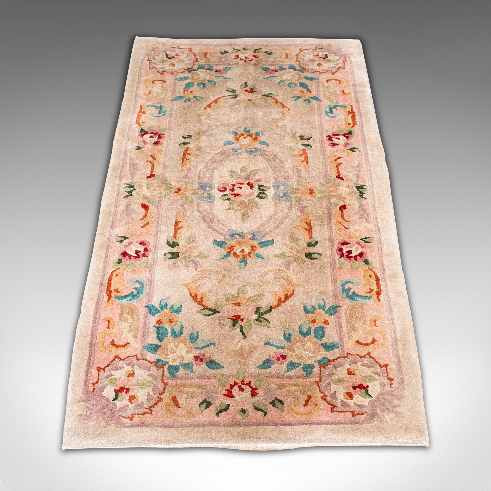 This is a vintage hallway rug. An oriental, quality woven decorative carpet, dating to the late 20th century, circa 1970.

Generously sized for the entrance hall at 76.5cm x 155cm (30