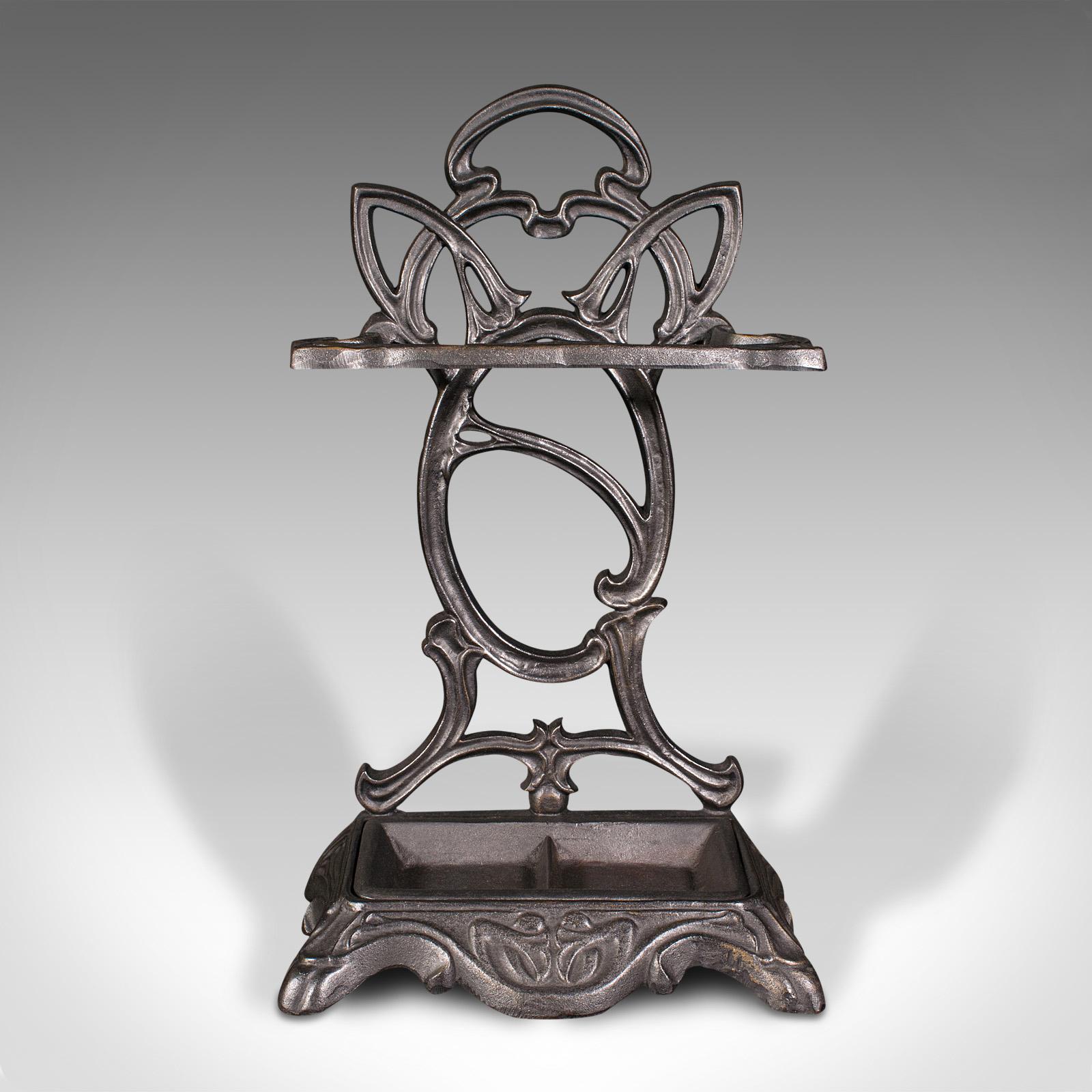 This is a vintage hallway stick stand. An English, cast iron umbrella rack displaying Art Nouveau revival taste, dating to the mid 20th century, circa 1960.

Attractive mid-century stand with appealing Victorian Art Nouveau overtones
Displays a