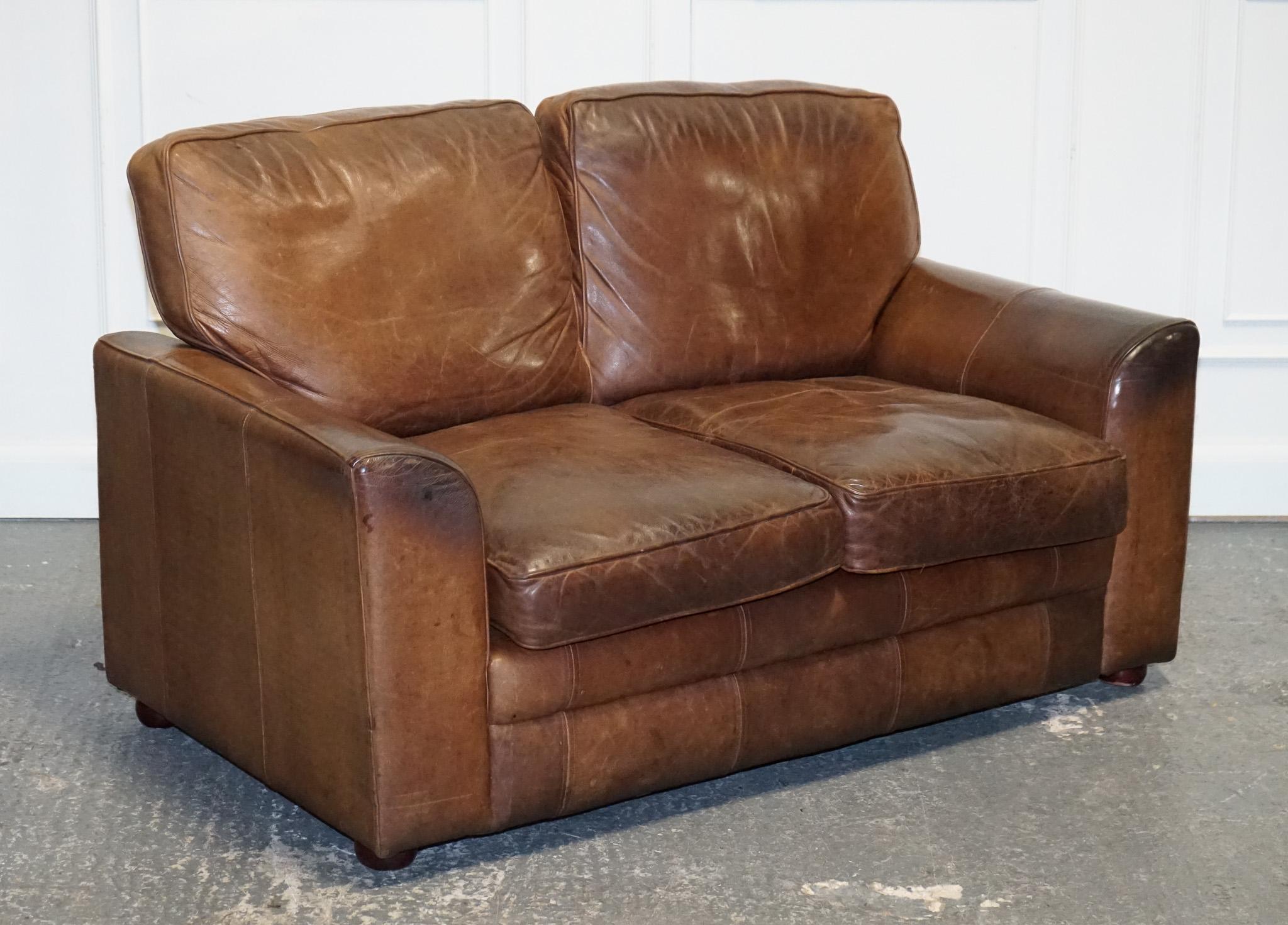 
We are delighted to offer for sale this Vintage Halo Two Seater Leather Sofa.

A very good quality sofa with some wear top it as you can see on the pictures and as you would expect with any vintage or antique item. 

Please carefully examine the
