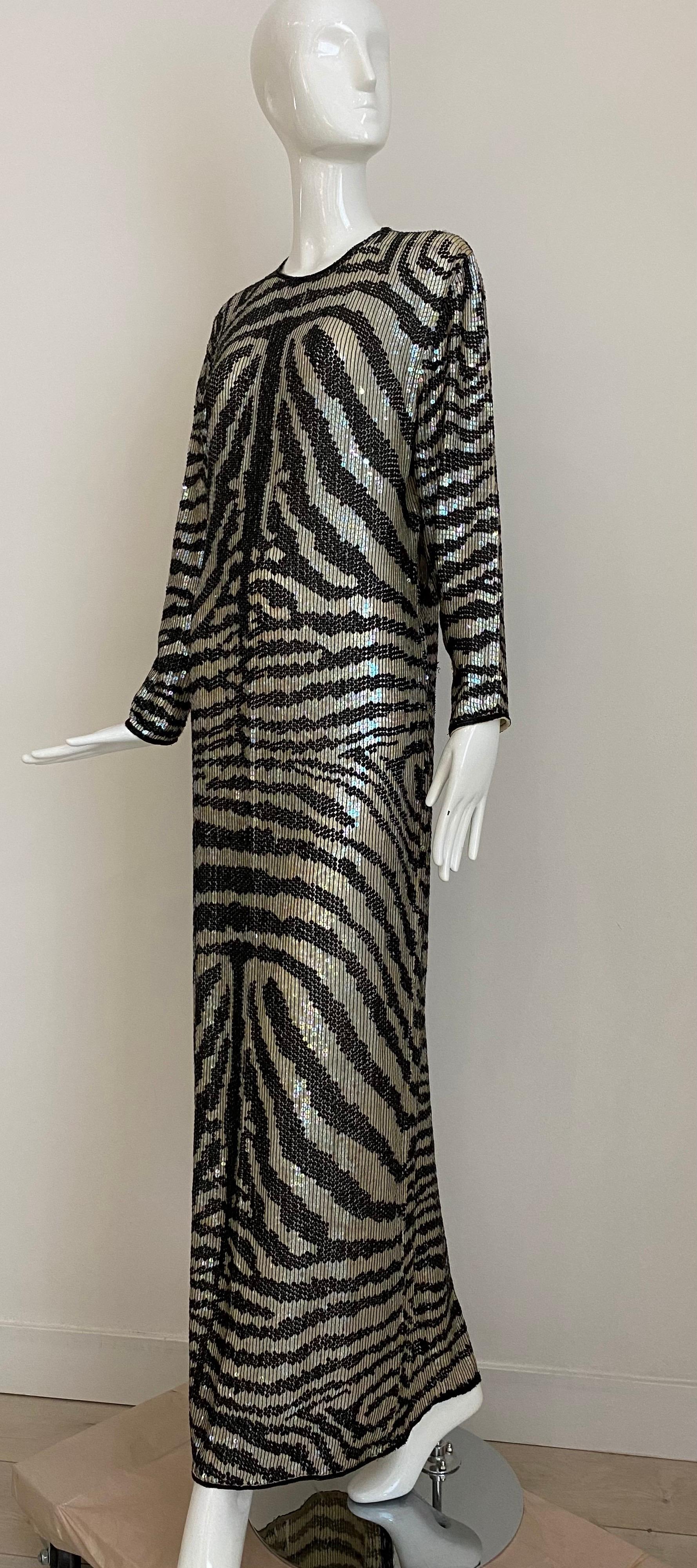 1970s HALSTON Black and silver sequins tiger stripes maxi dress
Size: Medium
Bust: 40” / Waist: 35” / Hip :42” / sleeve length: 24”/ Dress length: 57”