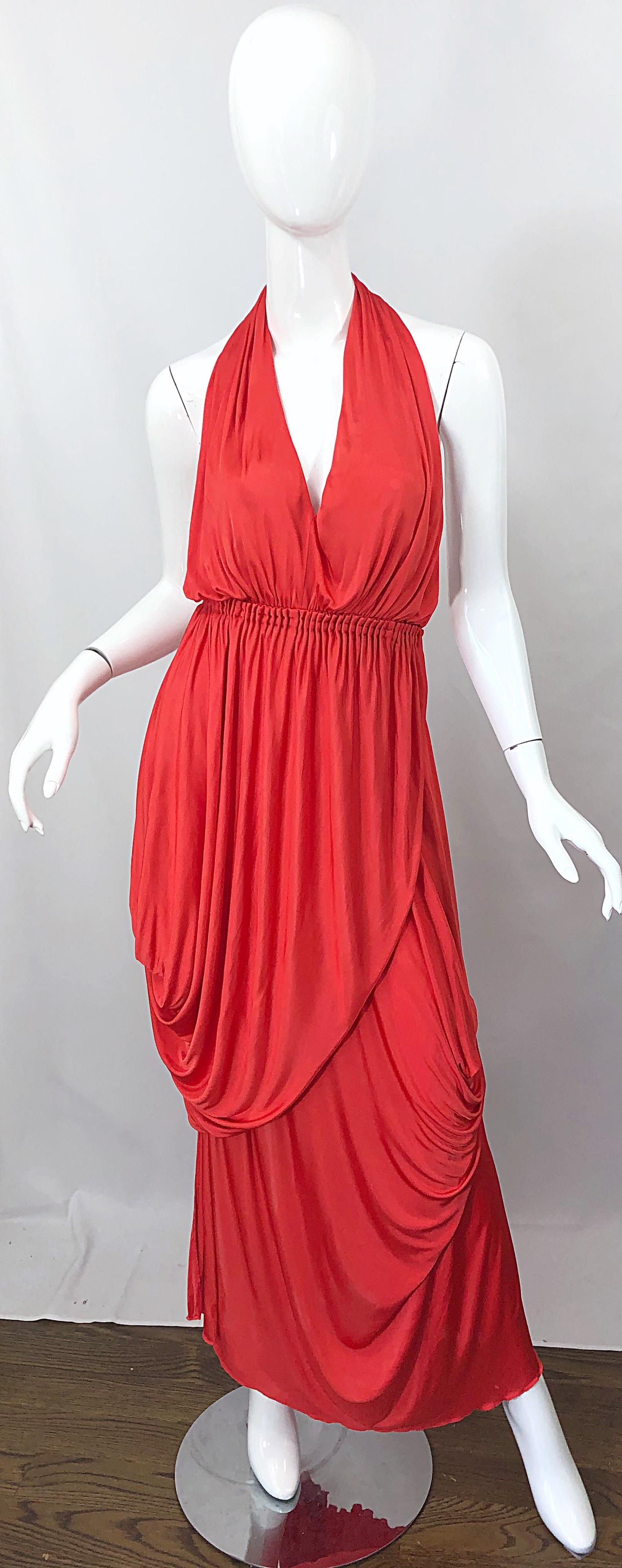 Sexy vintage HALSTON coral silk jersey plunging asymmetrical hem backless wrap gown! Features layers of silk jersey that effortlessly drape the body. There are no zips on this rare gem; the dress simply slips over the head, then you wrap one side to