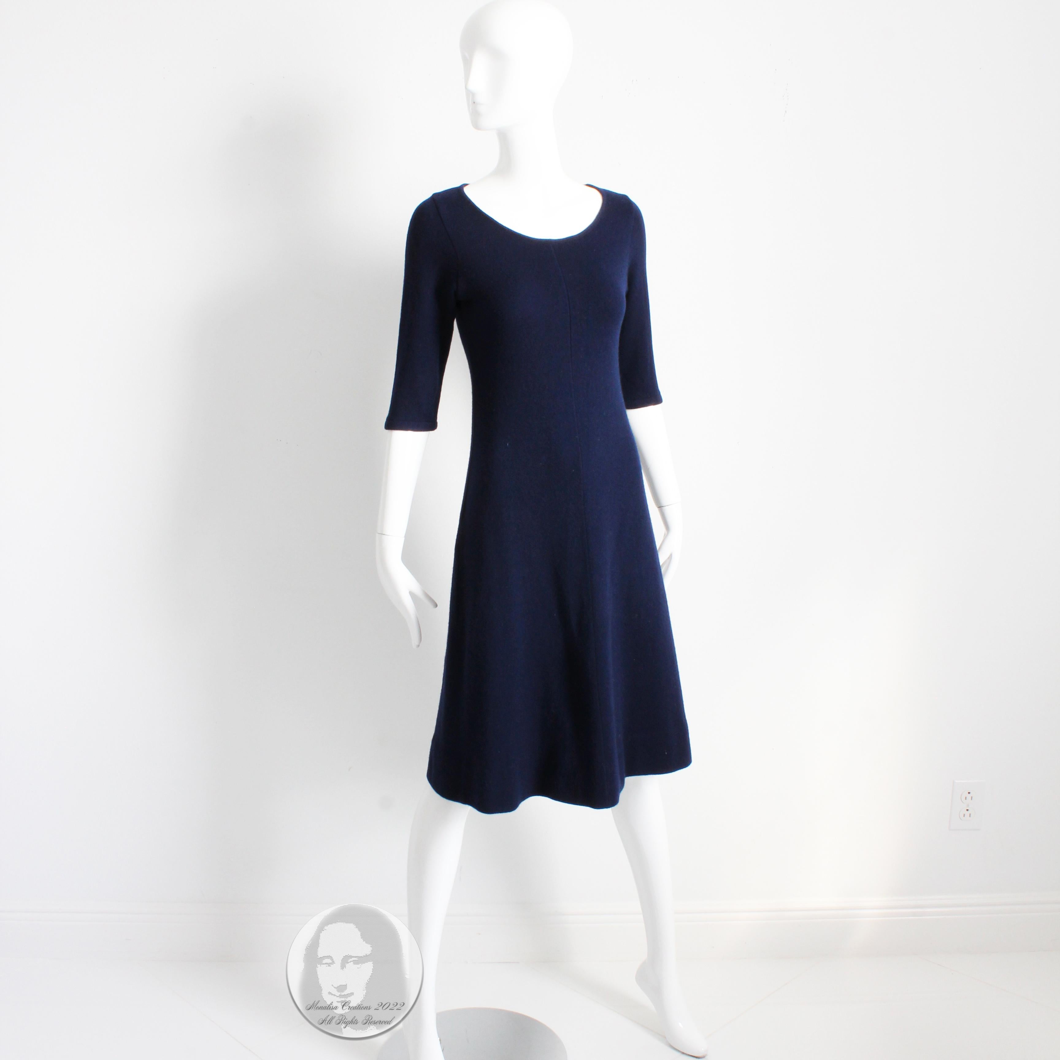 Vintage Halston cashmere knit dress in a rich navy blue, most likely made in the 70s.  Constructed from the most incredibly soft cashmere, it slips over the head and is cut to hug your upper body while gently flaring at the hem.  Incredibly simple