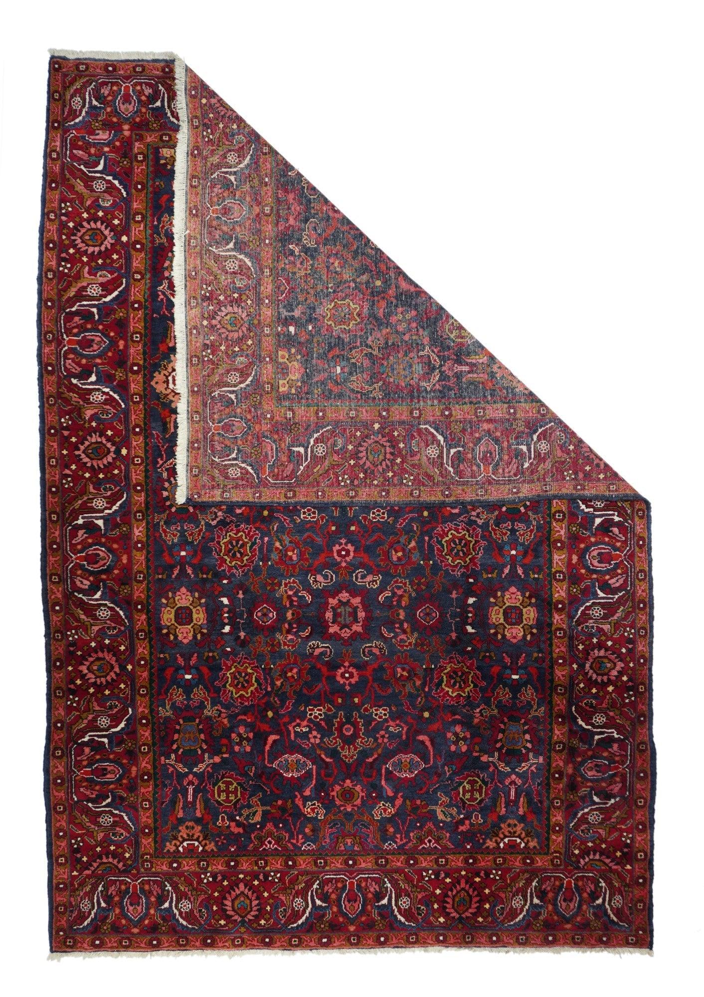 Vintage Hamadan Rug 7'5'' x 11'5''. The abrashed royal blue ground shows an allover Harshang-related field with idiosyncratic palmettes, rosettes and broken vinery, with accent tones in rust, red, light blue, pale green and ecru. Strip style red