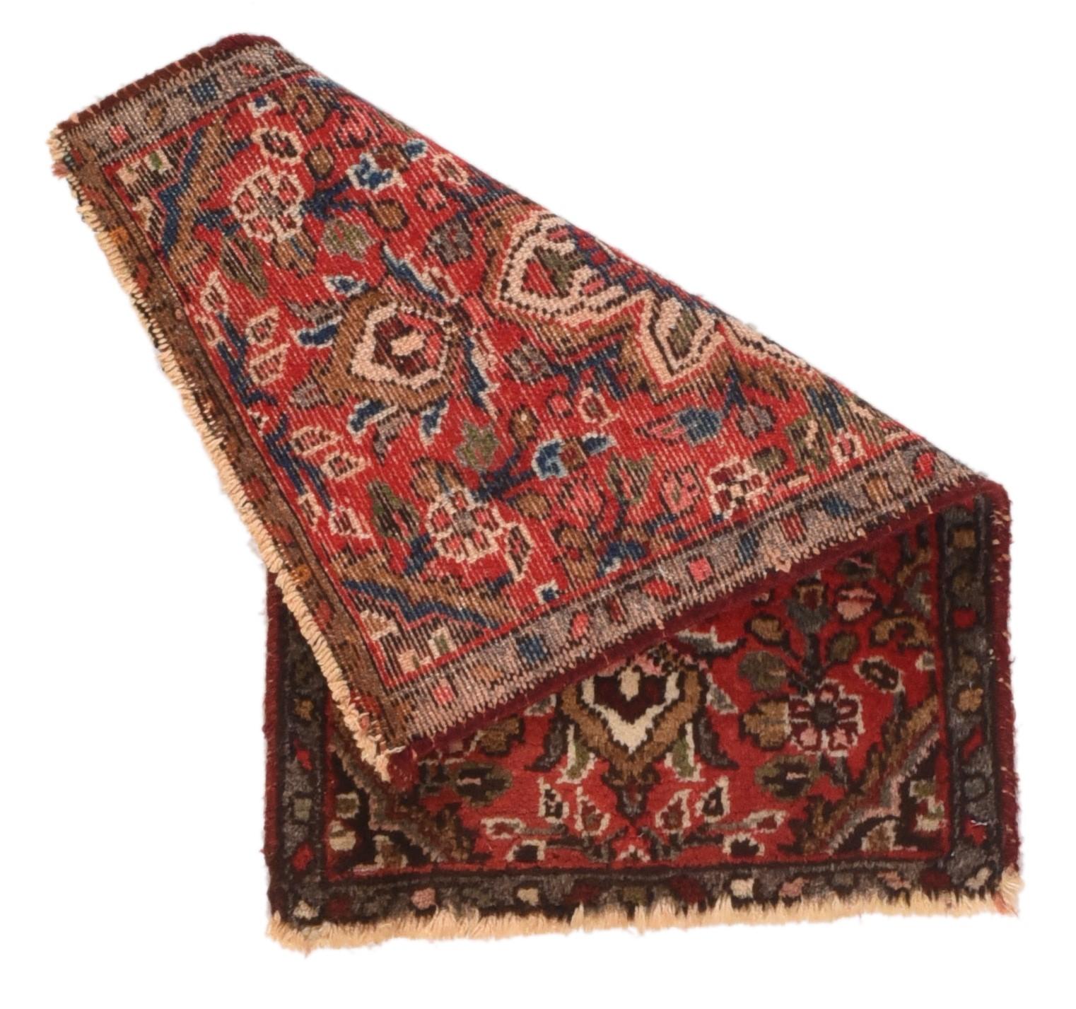 Vintage Hamedan Rug 1'5'' x 2'. Red field with a large ivory octofoil medallion against floral sprays. Narrow medium blue border. Ends need securing, fairly good condition. Moderate/coarse weave on cotton.