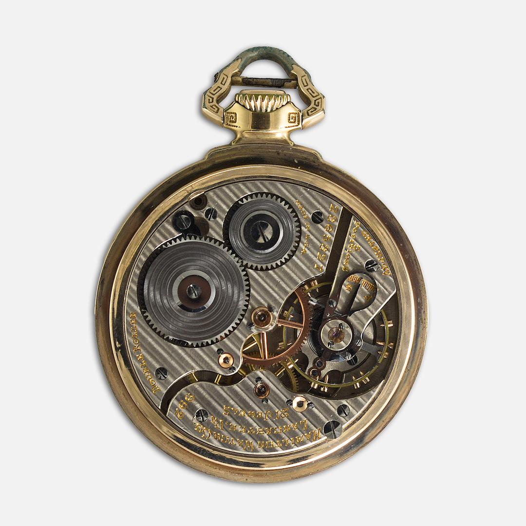 Hamilton gold filled, open face, Railroad pocket watch.
Size 16, 21 jewel double roller movement,  3/4 plate, 5 position adjustments, lever time set,  Grade 992.
The serial number is 2365327, made in 1930.
Some wear on the case.
The dial is in very