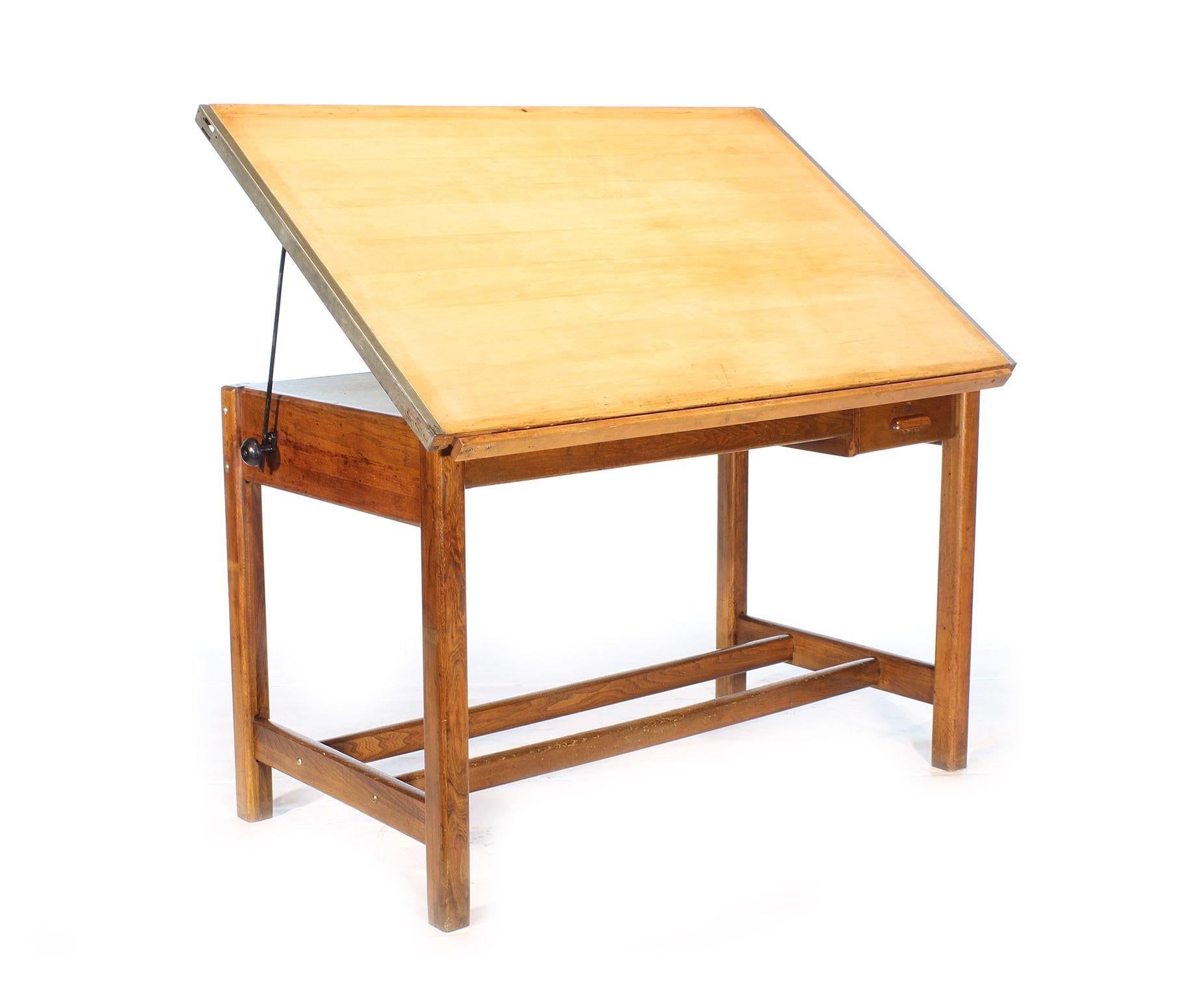 Vintage oak draftsman's desk or table. Authentic Hamilton adjustable tilt-top with blueprint and pencil drawers. Measures: 60
