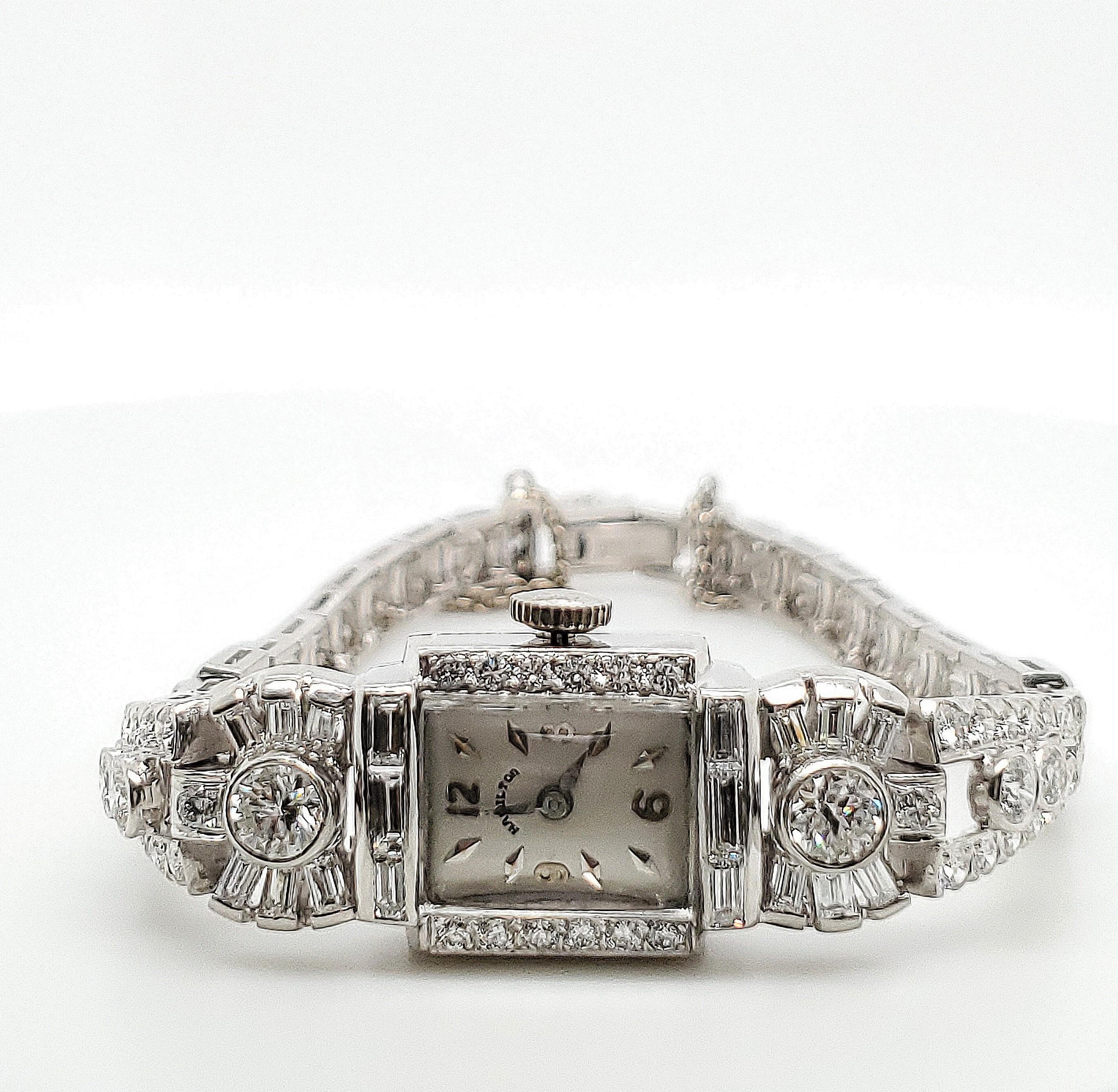 Elegant vintage ladies Hamilton watch crafted in platinum and set with approximately 5 carats of round brilliant, fancy, and single-cut diamonds (G-H color, VS clarity). The watch weighs 33.2g. Both the watch dial and movement are signed Hamilton.