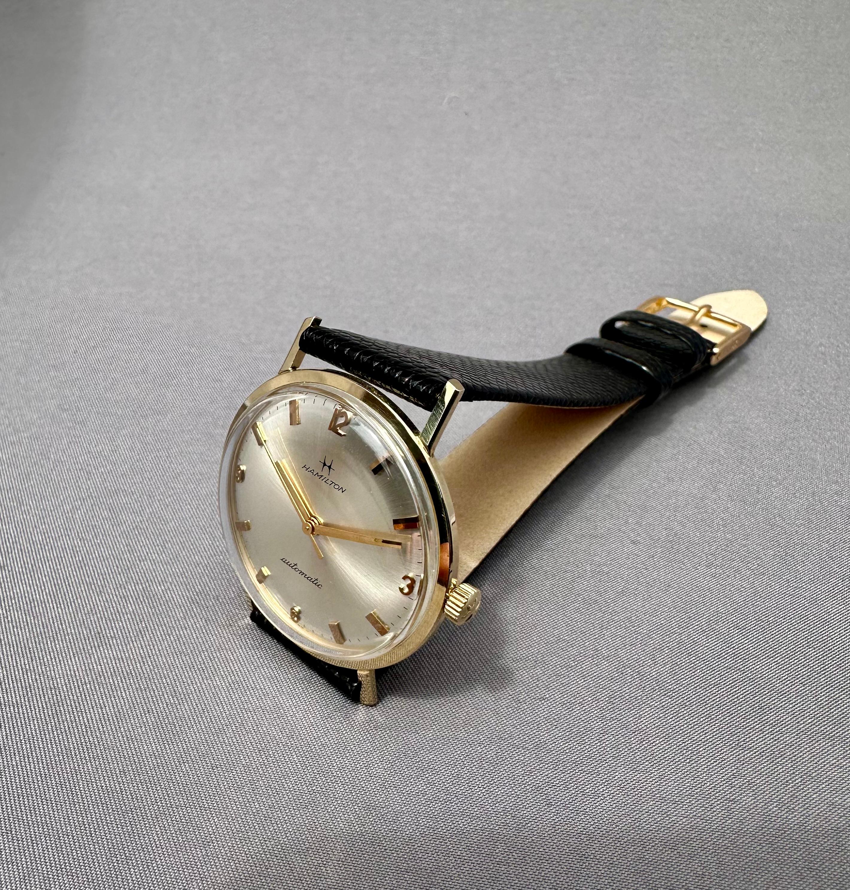 Vintage Hamilton Silver Dial 14k Solid Gold Automatic Watch - 1970's

Description / Condition: All watches have been professionally scrutinized and serviced prior to being offered for sale. 

Manufacturer: Hamilton

Model: Hamilton Classic

Year of