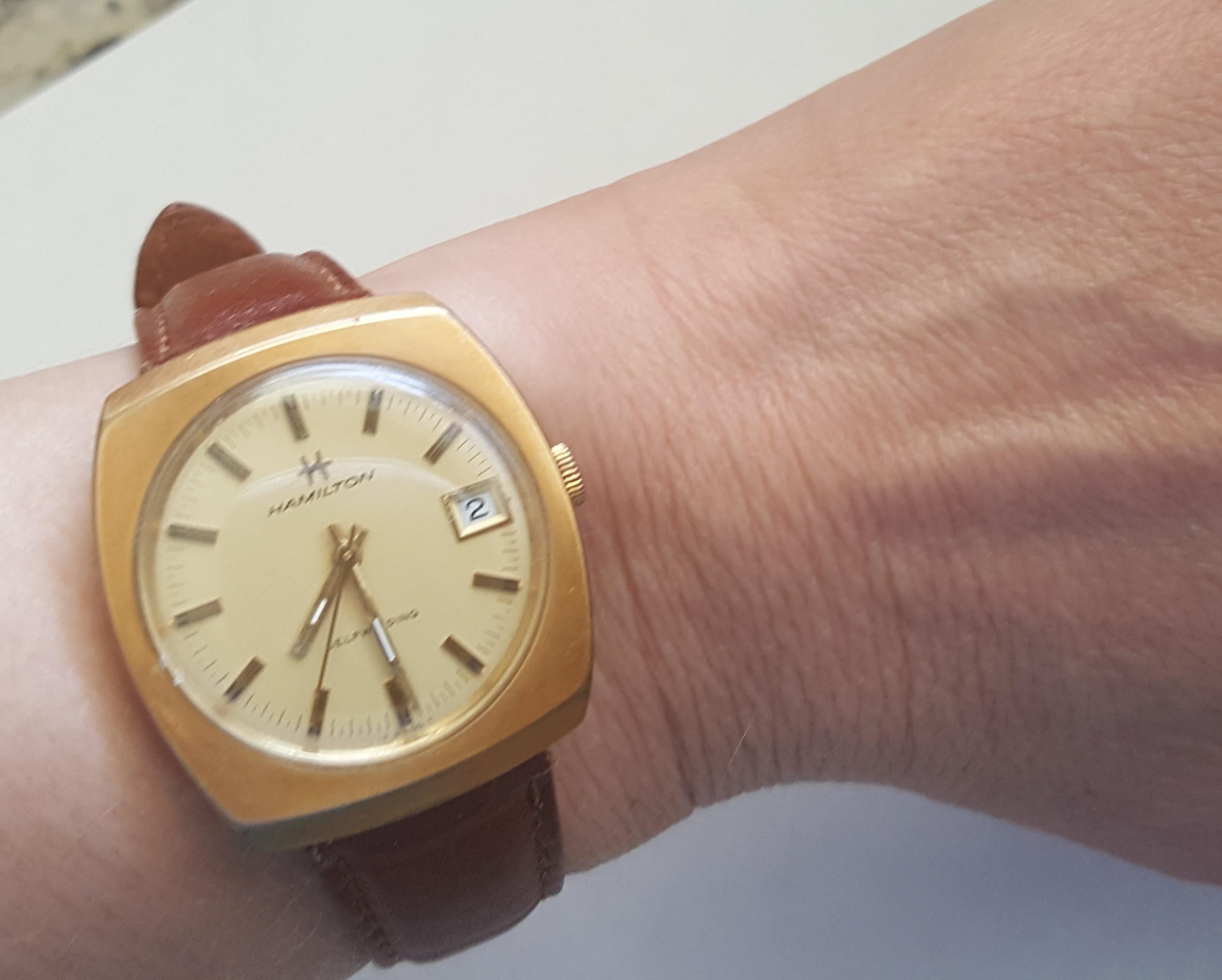 Vintage Hamilton Watch 1960's 14kt gold filled self winding swiss leather band. The diameter is 34mm by 38 mm. Very good condition. The crystal is 29 mm in diameter and the thickness of the dial is 11mm. The total length of the watch and the band is