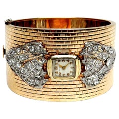 Montre Hamilton en or 14k et bracelet manchette en diamants, années 1950 