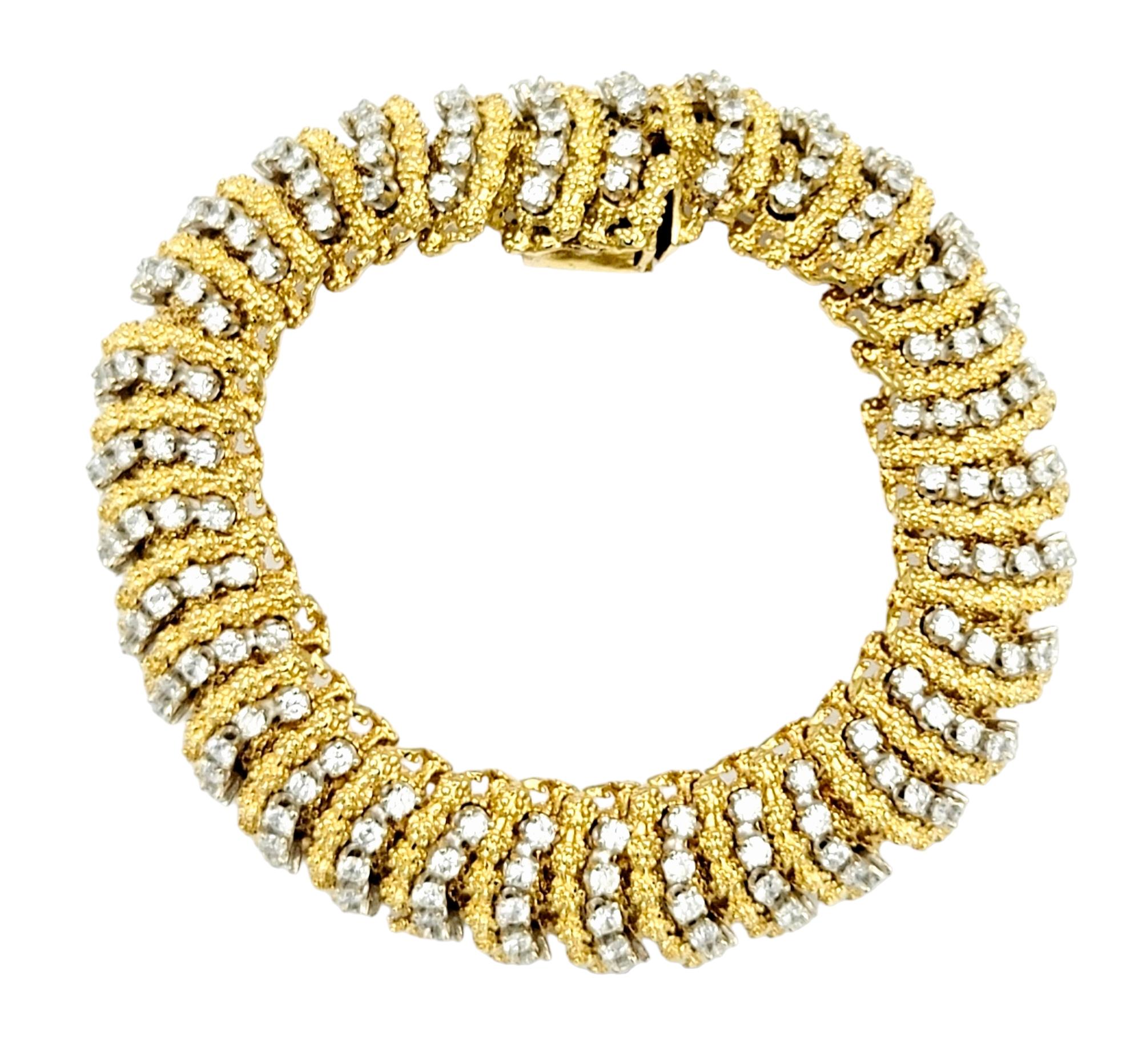 The gold and diamond vintage caterpillar bracelet by the renowned Hammerman Brothers is a true testament to timeless elegance and expert craftsmanship. Set in luxurious 18-karat yellow gold, this bracelet features a distinctive design that mimics
