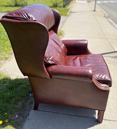 Vintage Hancock and moore burgundy leather wing back chair/recliner