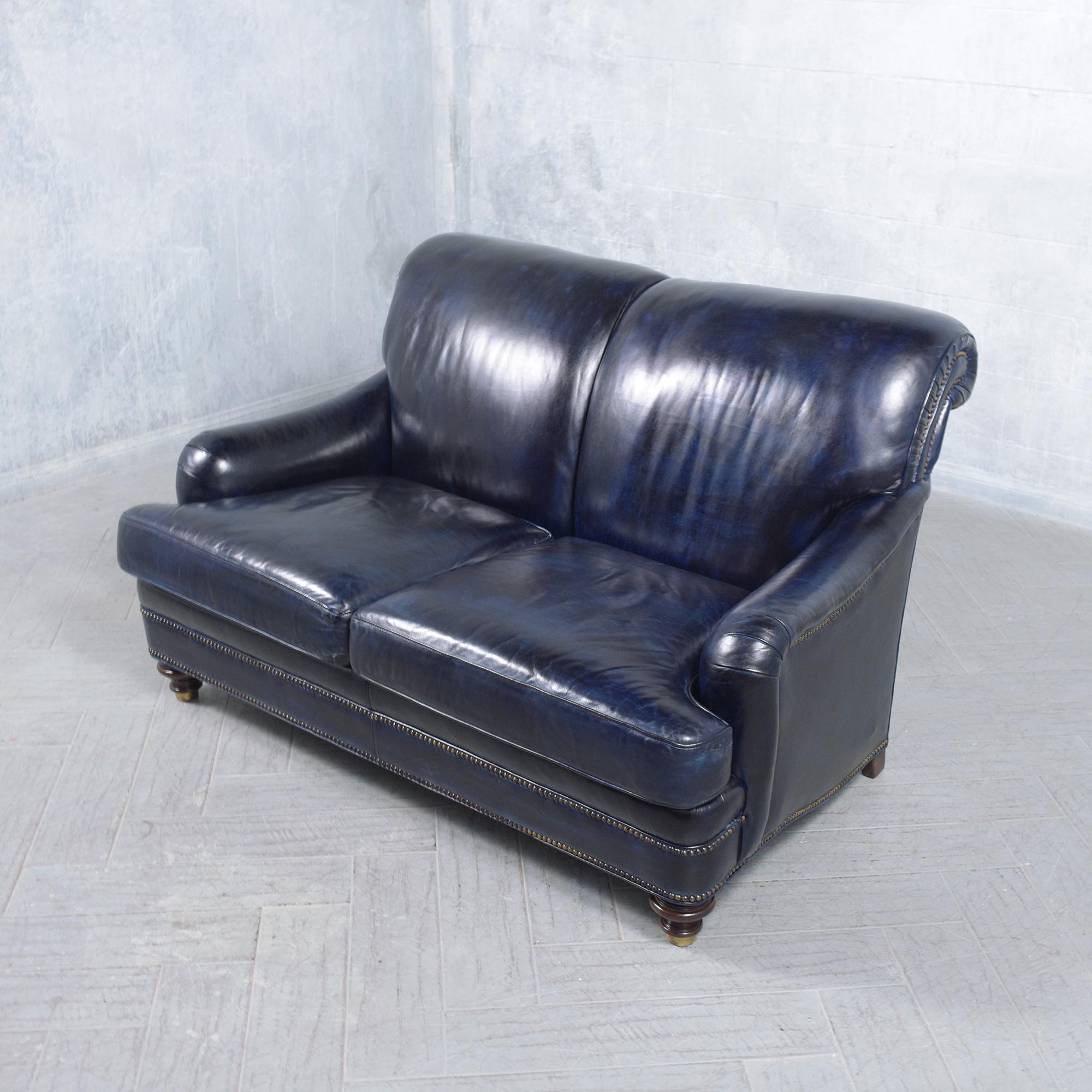Late 20th Century Hancock & Moore Loveseat: Classic English Elegance in Navy Blue Leather