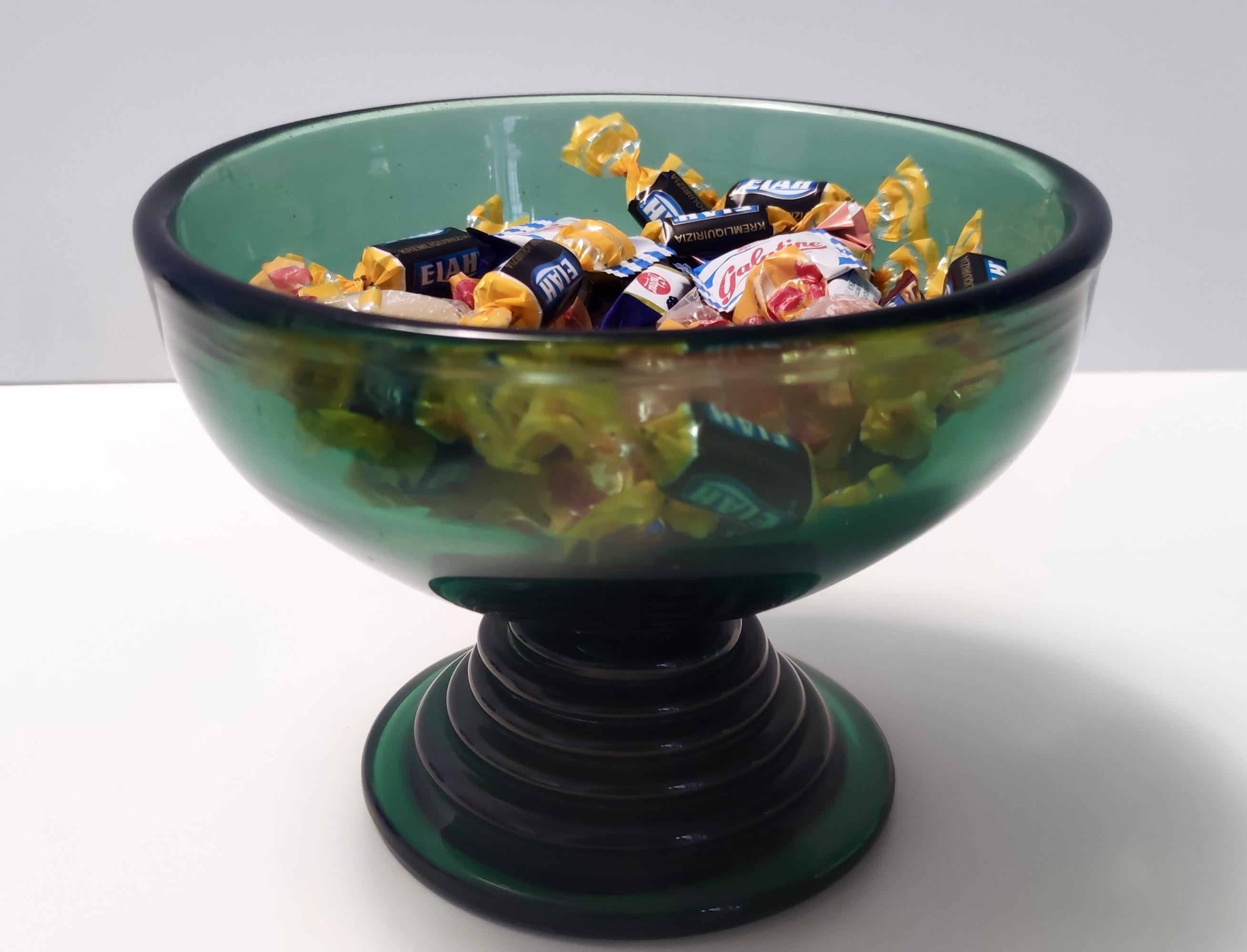 Made in Empoli, Italy, 1940s. 
It is a high-quality centerpiece made in green hand blown glass.
This is a vintage piece, therefore it might show slight traces of use, but it can be considered as in perfect original condition.

Measures : Diameter: