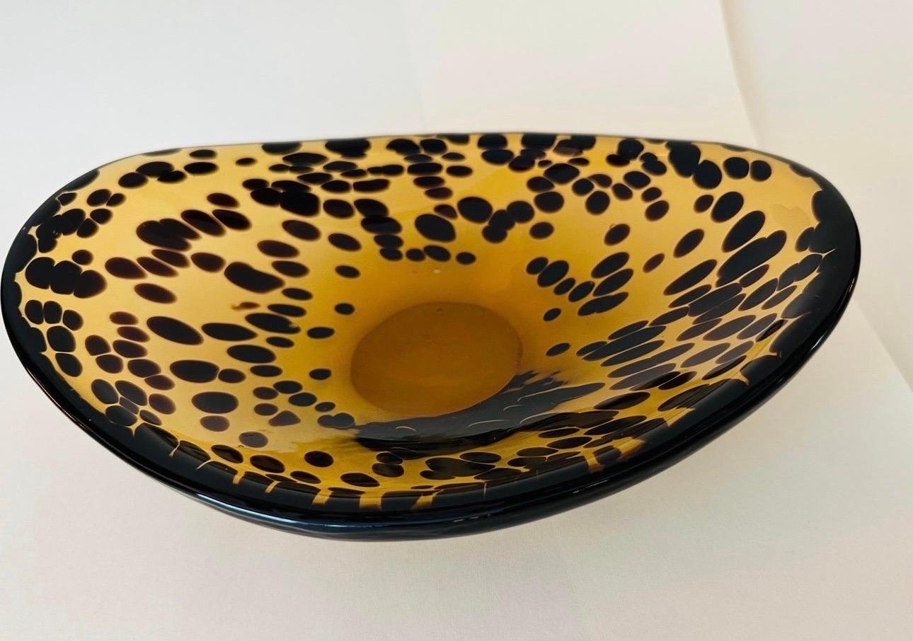 Vintage large handblown thick glass shallow catch all bowl. In great condition. No chips or cracks. Beautiful faux tortoise shell pattern.