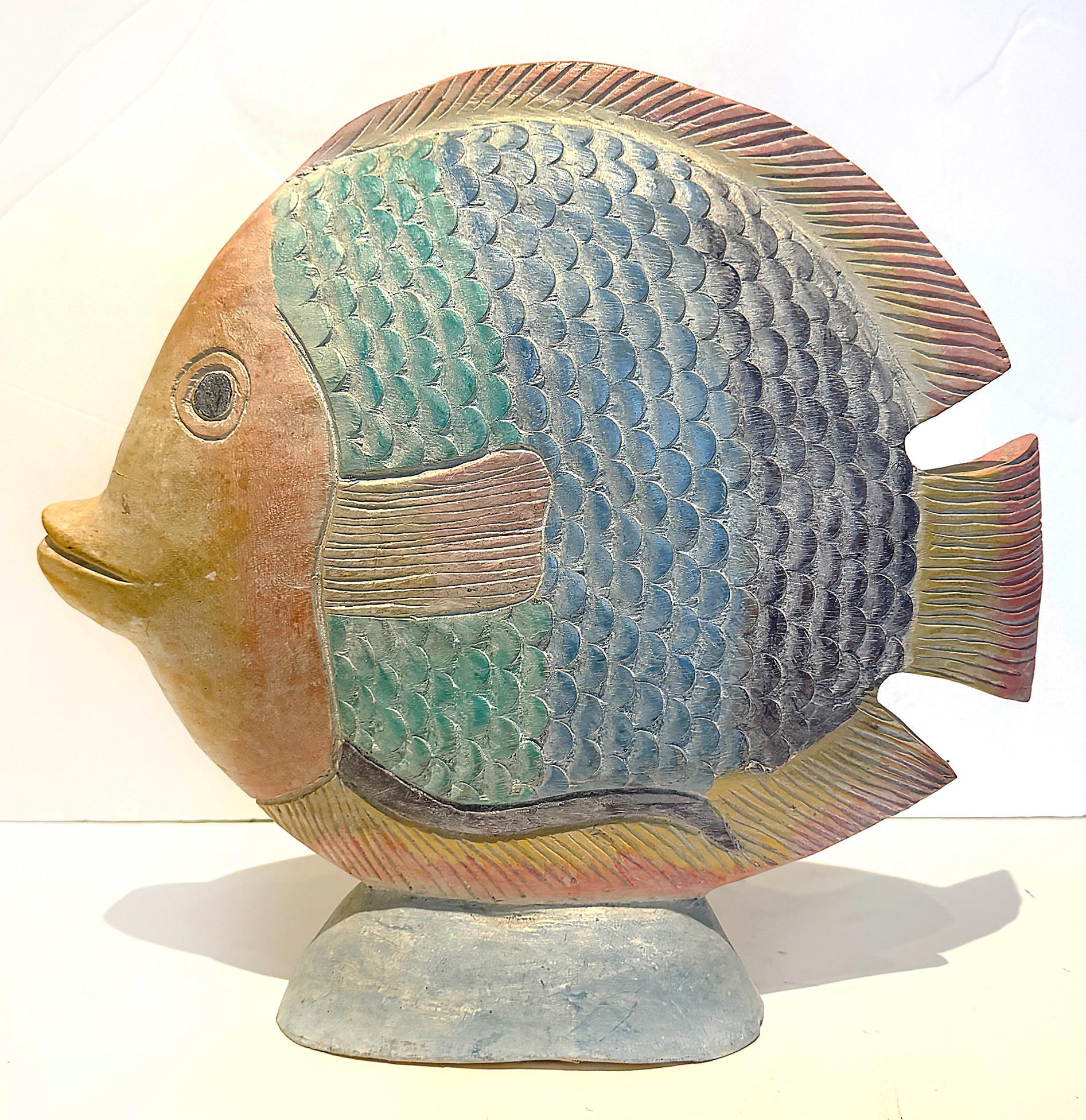 Vintage Hand Carved and Painted Wood Tropical Fish Sculpture

Offered for sale is a vintage hand carved wooden tropical fish painted in pastel colors. The fish is mounted on a base. This will work well in a coastal setting.

14.5 h x 15.5w x 3.5d

