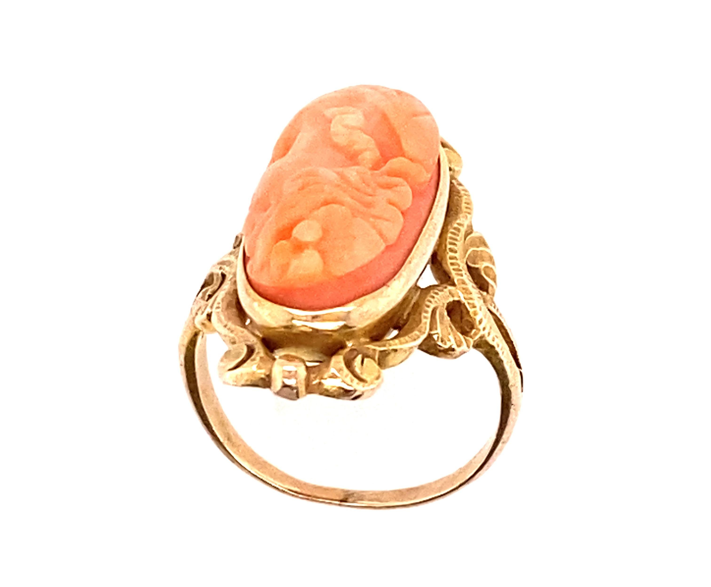 Genuine Original Art Noveau Antique from 1895's-1910's Hand Carved Angel Skin Coral Cameo Cocktail Ring  14K Yellow Gold

 

Featuring a Gorgeous 18.8 x 9.5 mm Angel Skin Coral Hand Carved Cameo

Exquisite Hand Carved Angel Skin Coral Eye