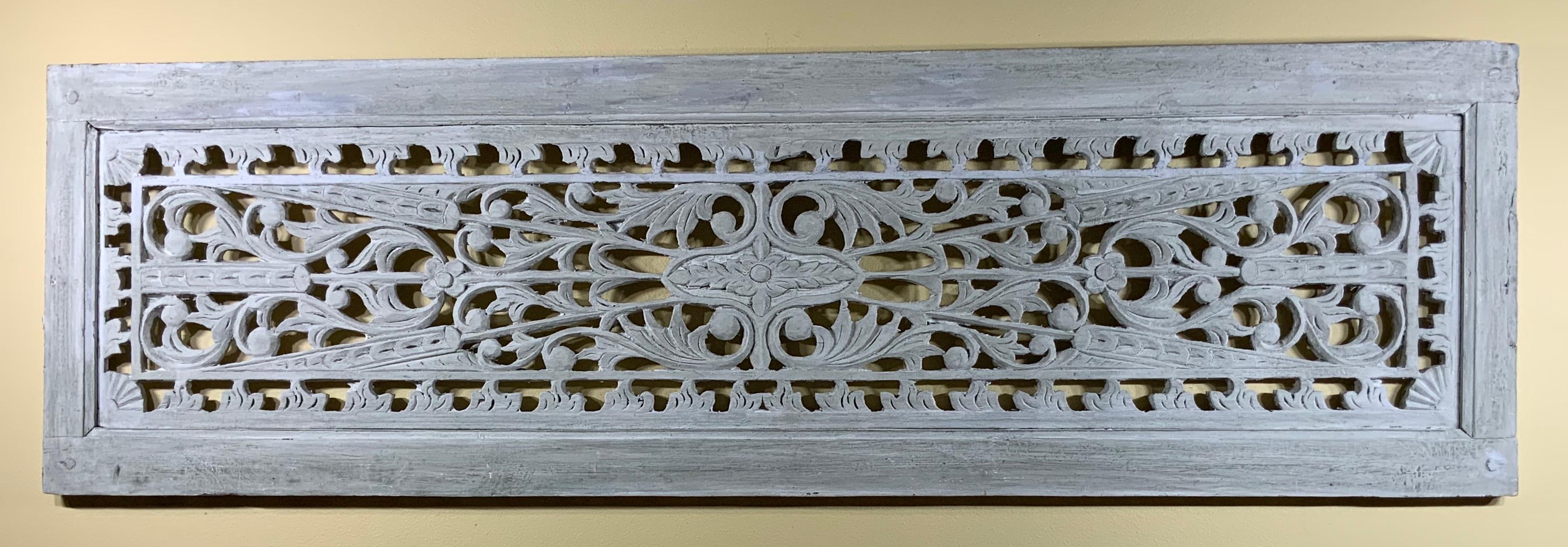 Beautiful wood hand carving wall hanging from solid wood, with vine, flowers and arrows motifs hand painted in gray color. Very impressive wall hanging.