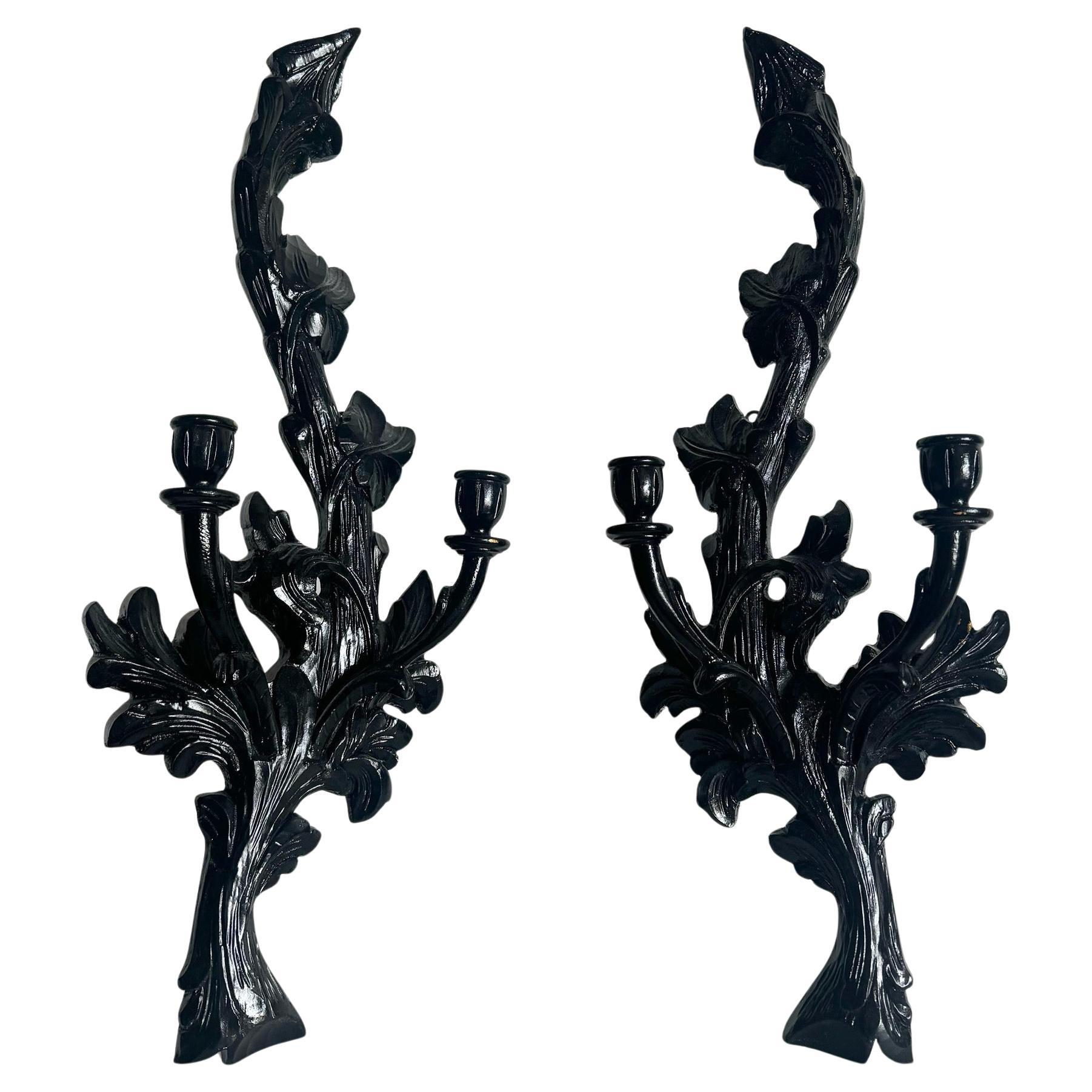 Coppia di candele vintage in legno nero intagliate a mano