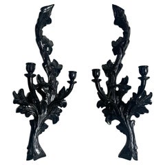 Paire d'appliques à bougie vintage en bois noir sculpté à la main
