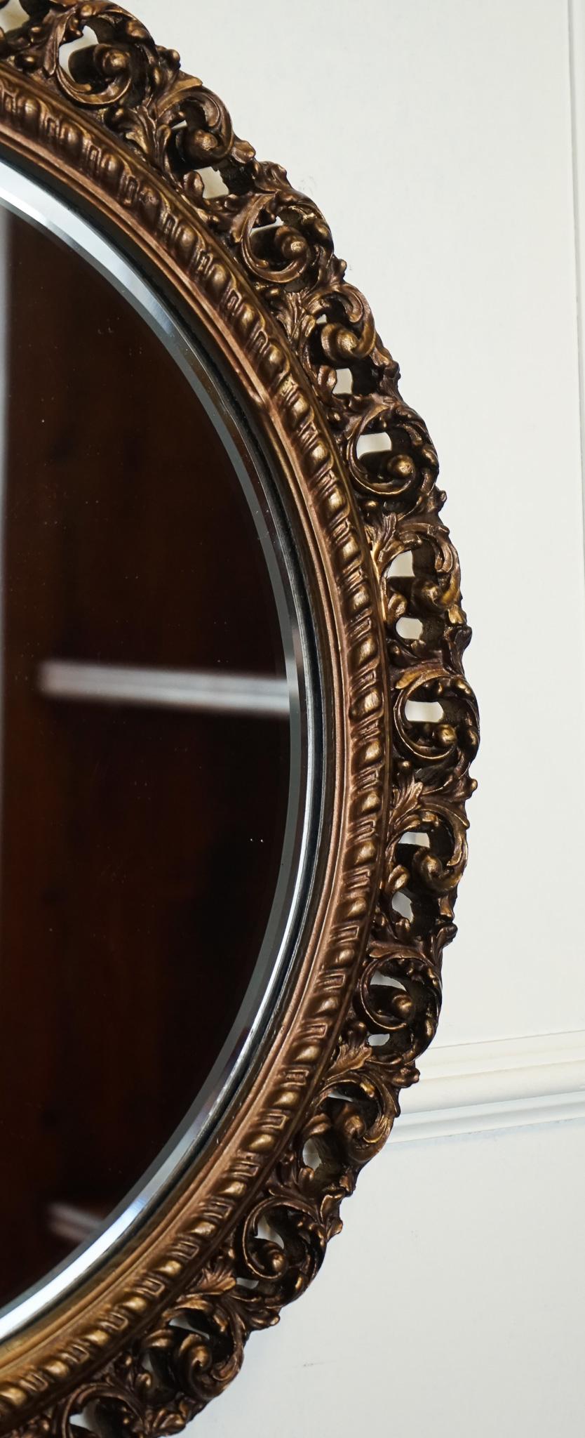 Hand-Crafted VINTAGE HAND CARVED BRONZE CIRCULAR BEVELLED WALL MIRROR j1 For Sale