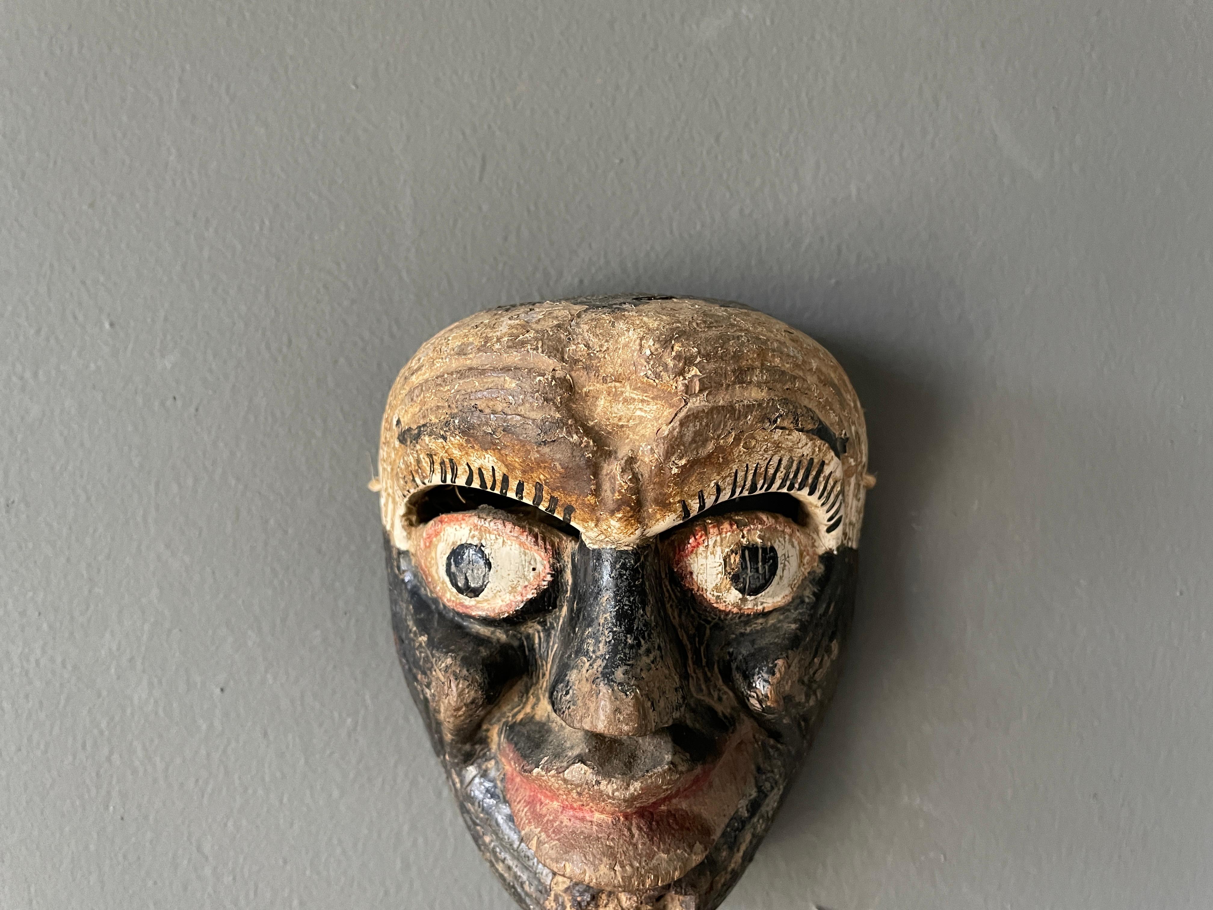 Vintage Hand Carved Childs Size Tribal Mask In Distressed Condition In Costa Mesa, CA