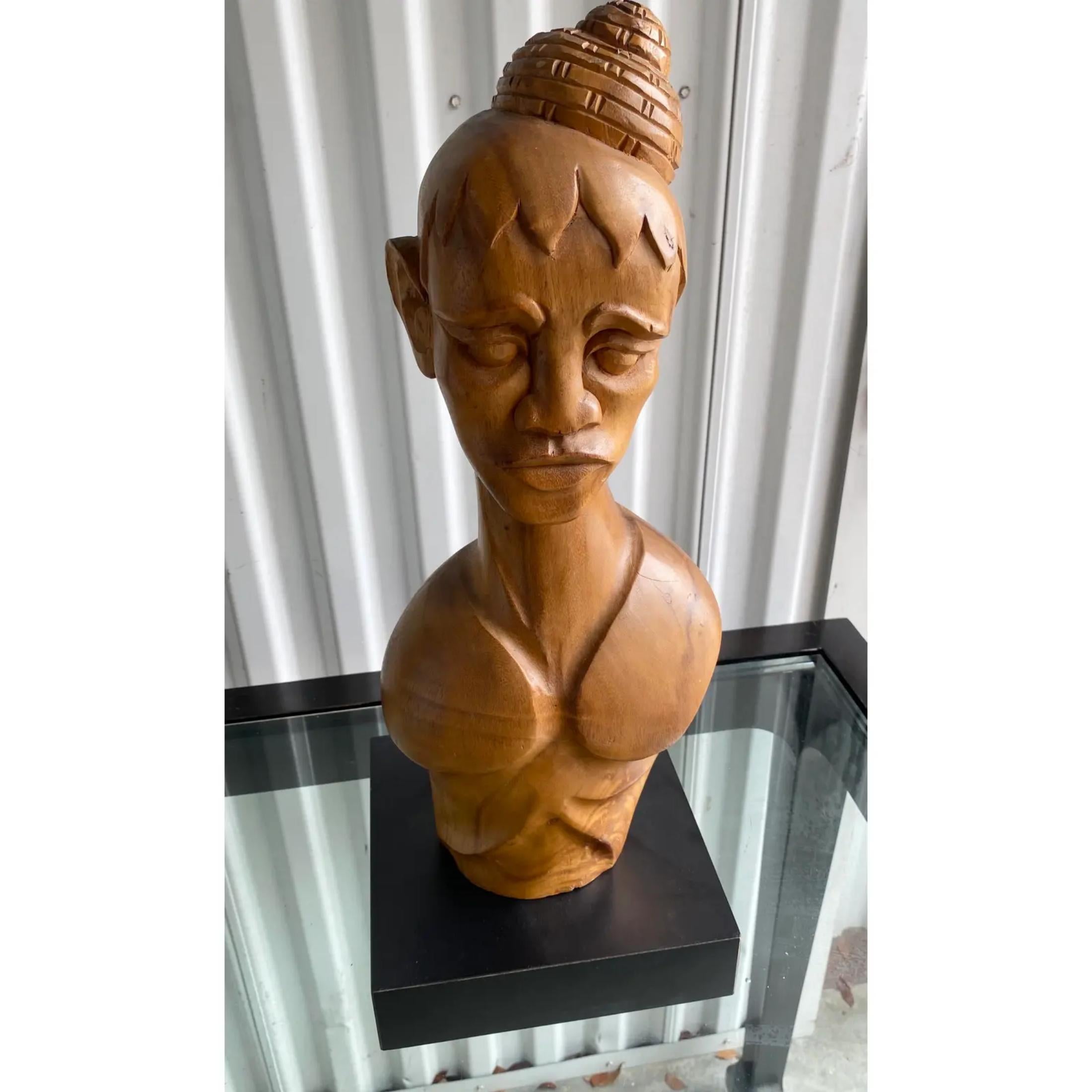 Stunning hand carved wooded sculpture. A lovely depiction of a female bust. Acquired from a Palm Beach estate.
