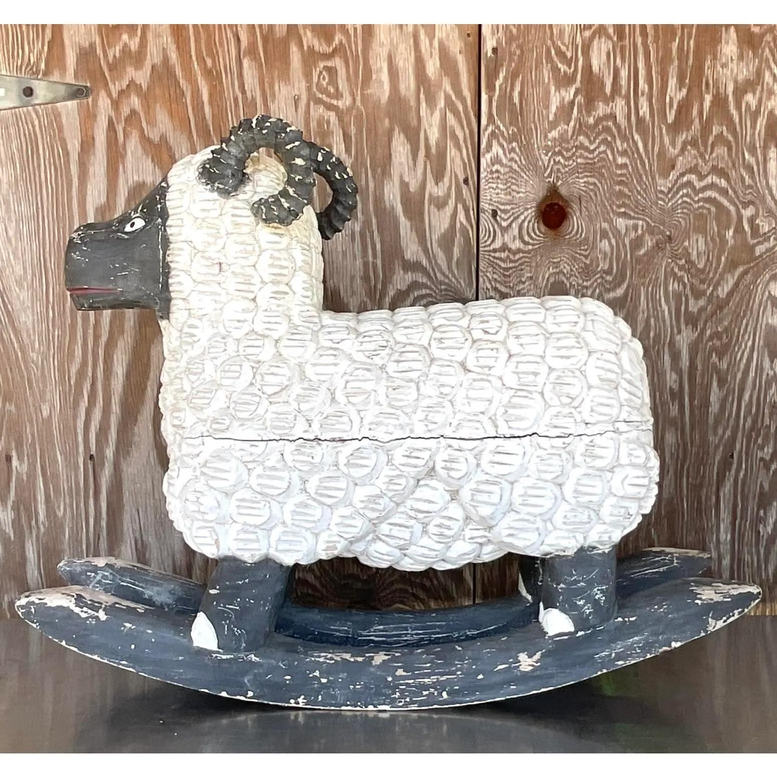 Fantastic vintage Folk Art rocking sheep. An amazing work with incredible hand carved detail. Lots of great gnarly wood blemishes appropriate to the style of the work. Acquired from a NY estate.