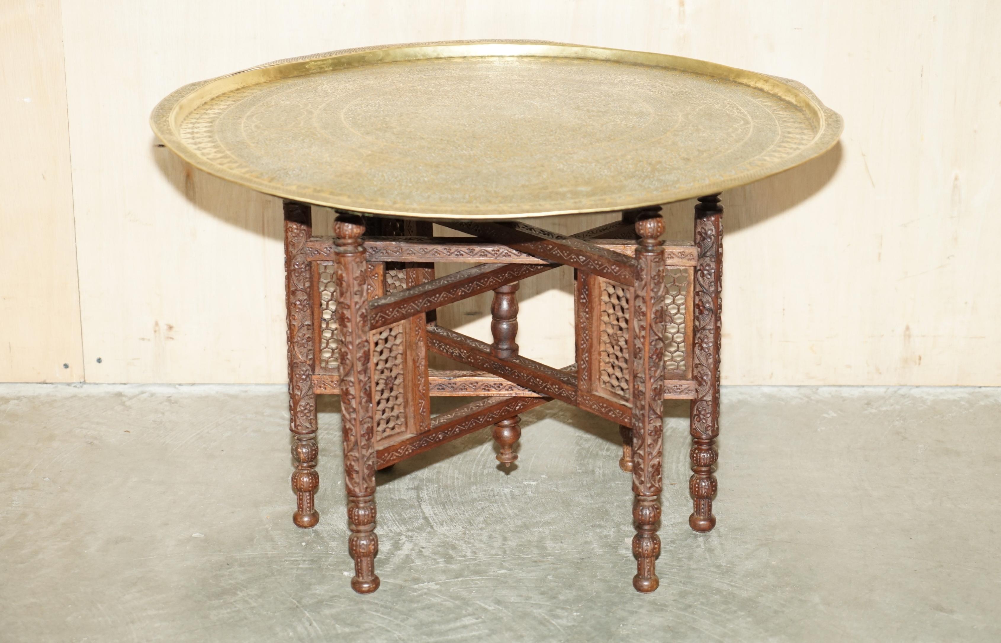 Royal House Antiques

Royal House Antiques is delighted to offer for sale this larger than normal, ornately hand carved Moroccan brass tray table retailed through Liberty's in the 1880-1900's

Please note the delivery fee listed is just a guide, it