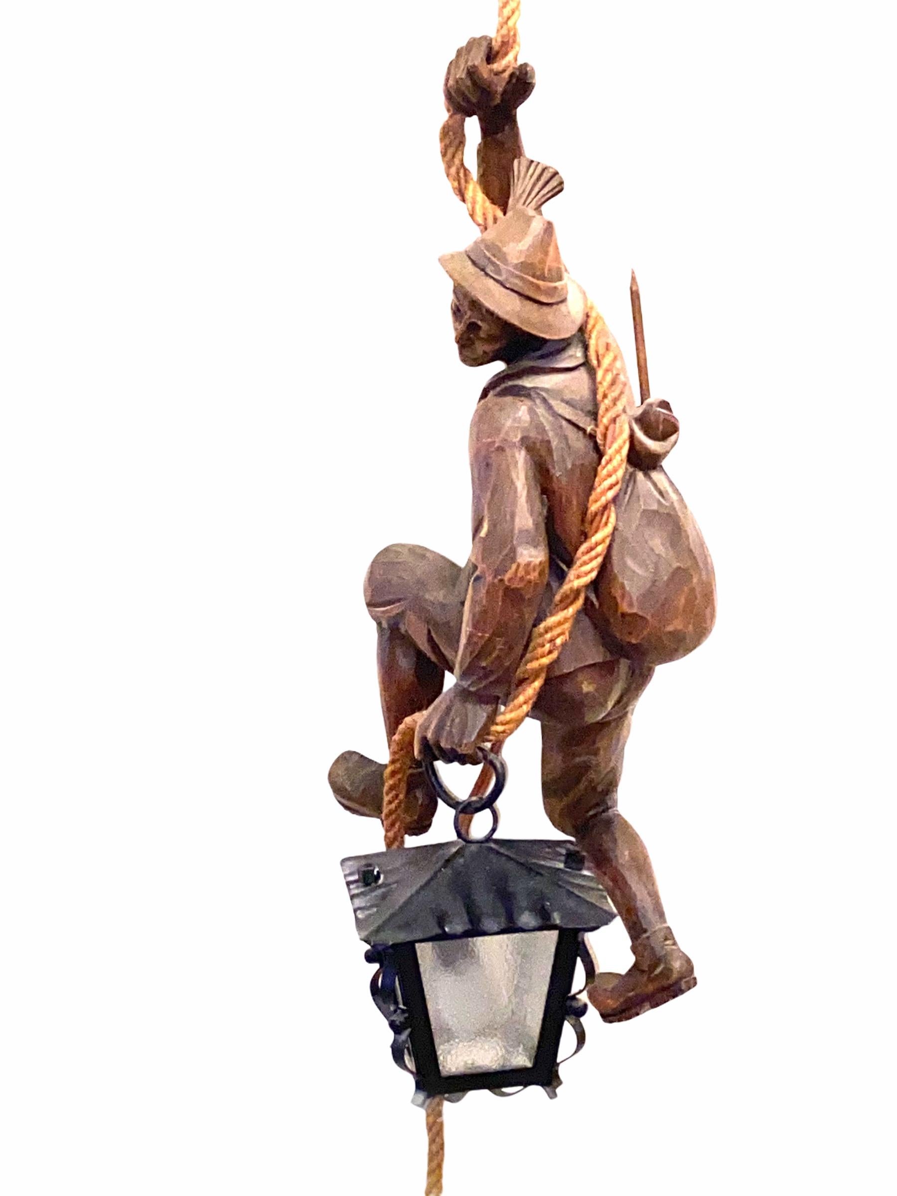 Vintage Hand Carved Mountain Climber or Mountaineer Pendant Light with Lantern In Good Condition In Nuernberg, DE