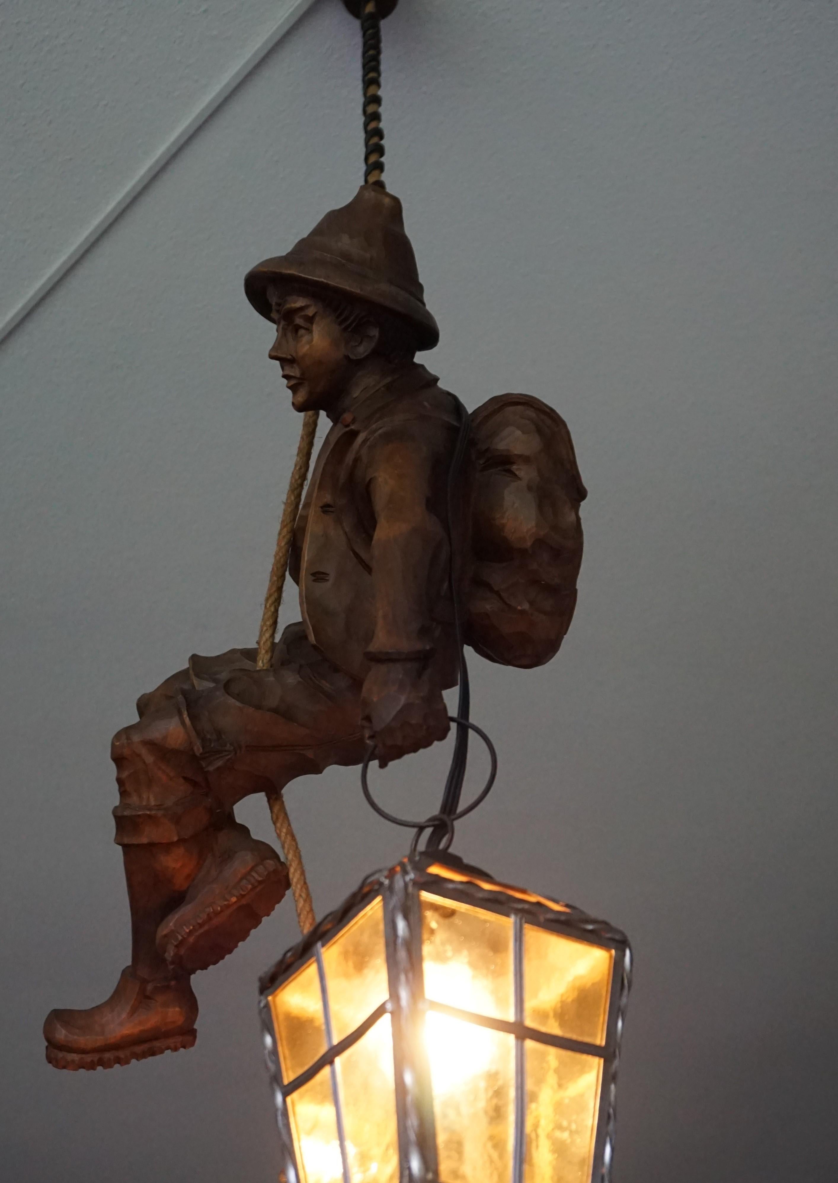 Vintage Hand Carved Mountaineer Sculpture Pendant Light w. Stained Glass Lantern In Excellent Condition In Lisse, NL