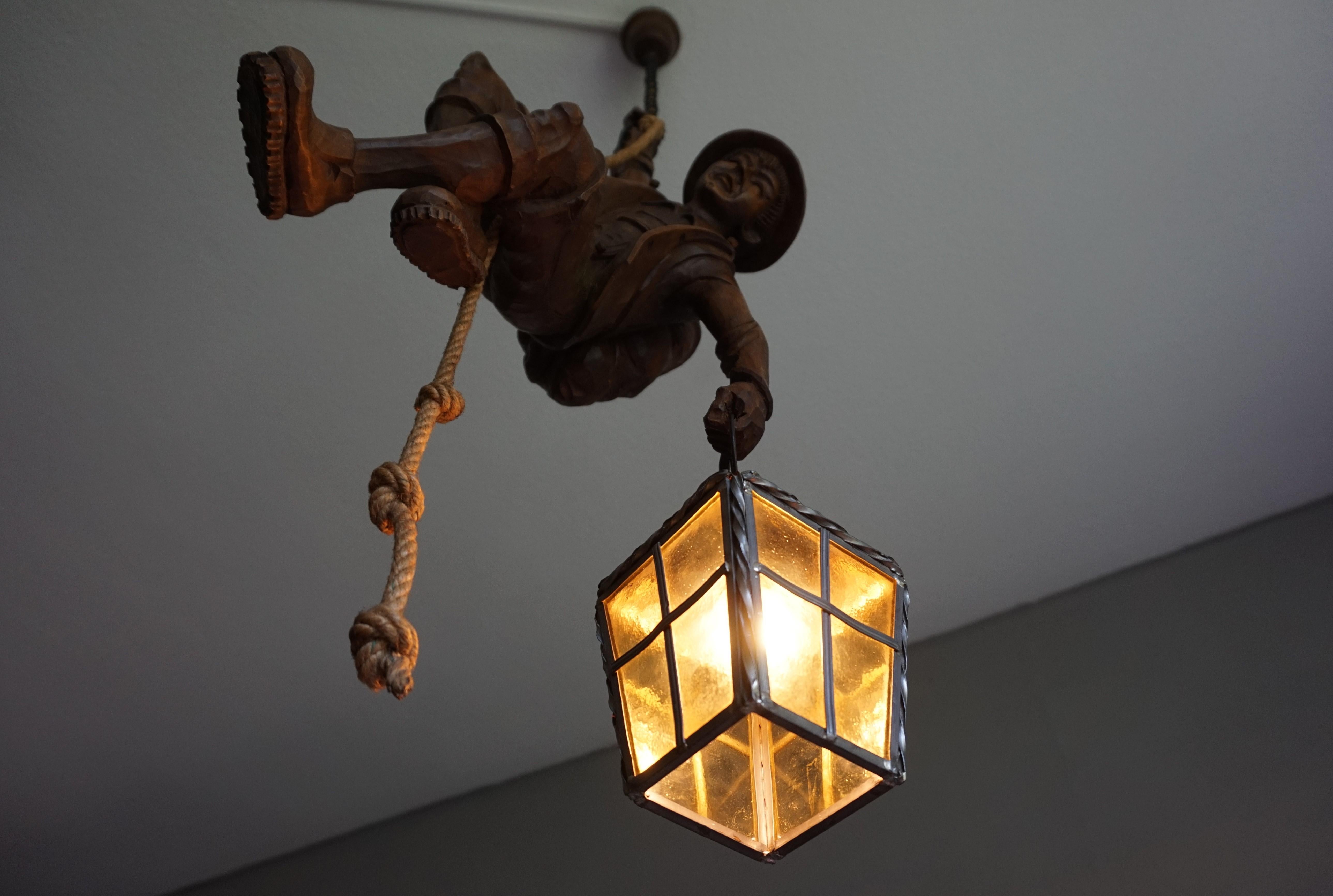 20th Century Vintage Hand Carved Mountaineer Sculpture Pendant Light w. Stained Glass Lantern