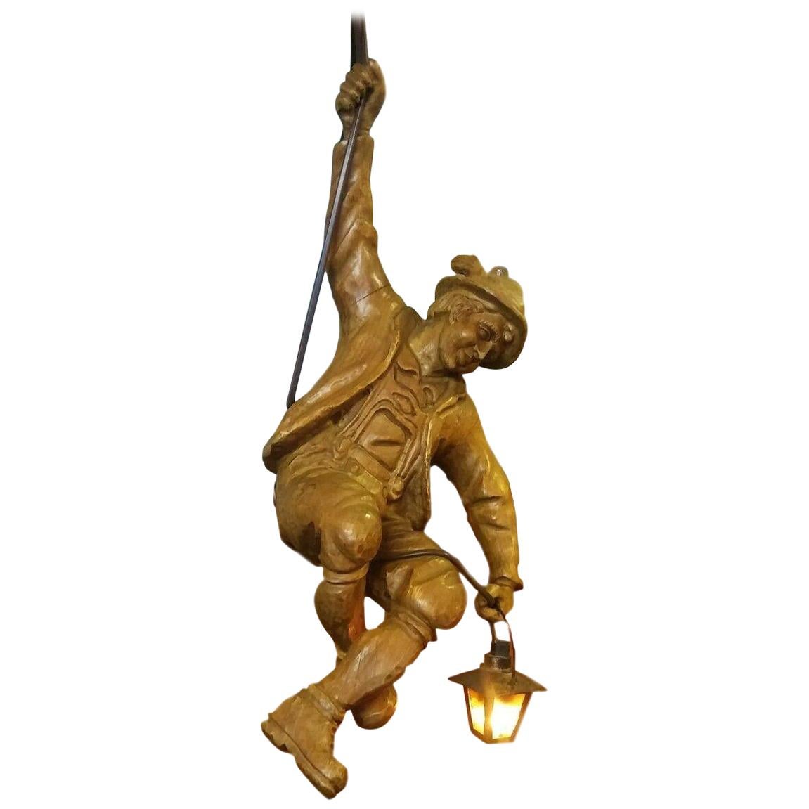 Vintage Hand Carved Mountaineer Sculpture Pendant Light with Glass Lantern