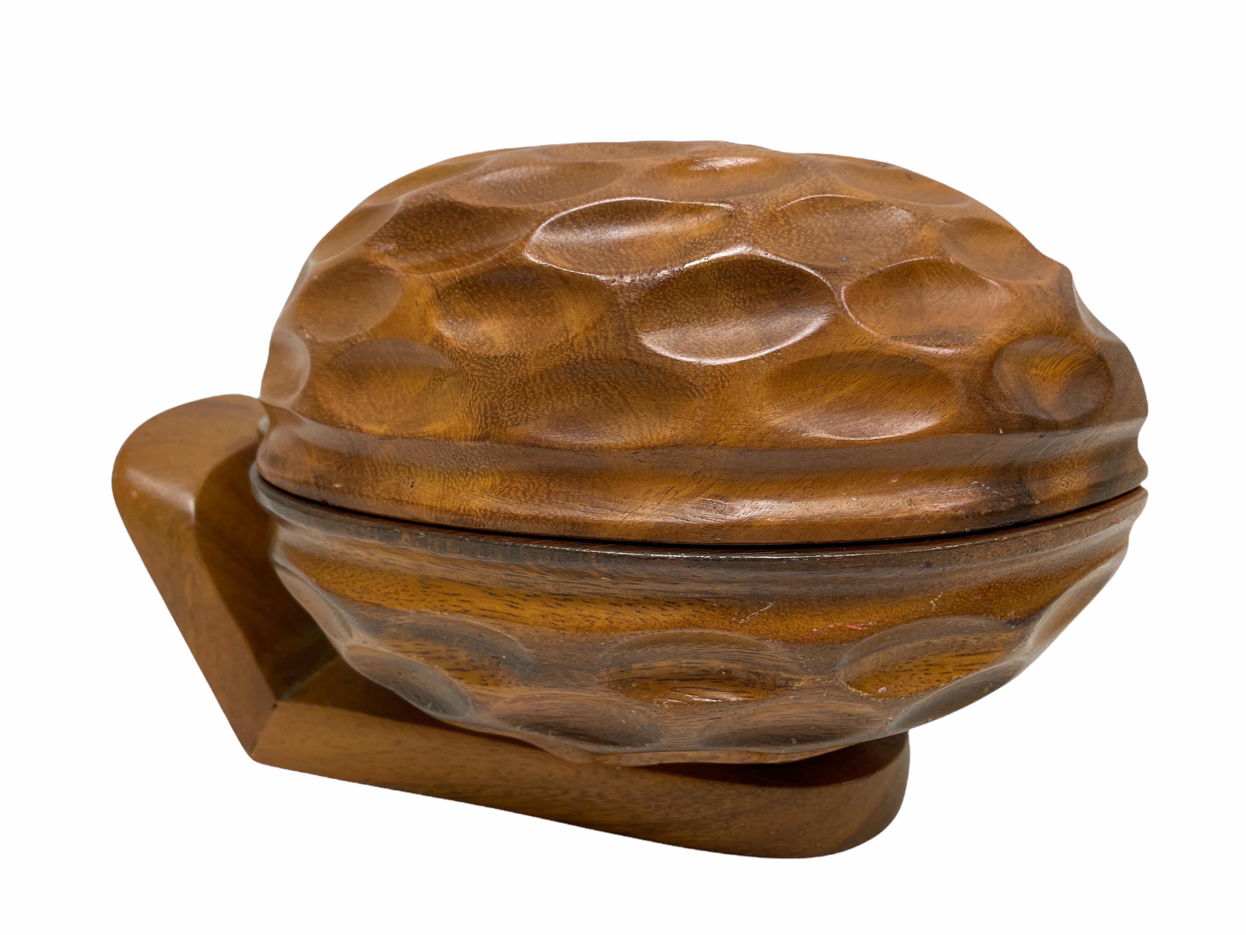 Found in Austria at an estate sale, this hand carved nut catchall is perfect for the collector. Nice Mid Century collectible to display in your home. Made by Talarico about 1960s.