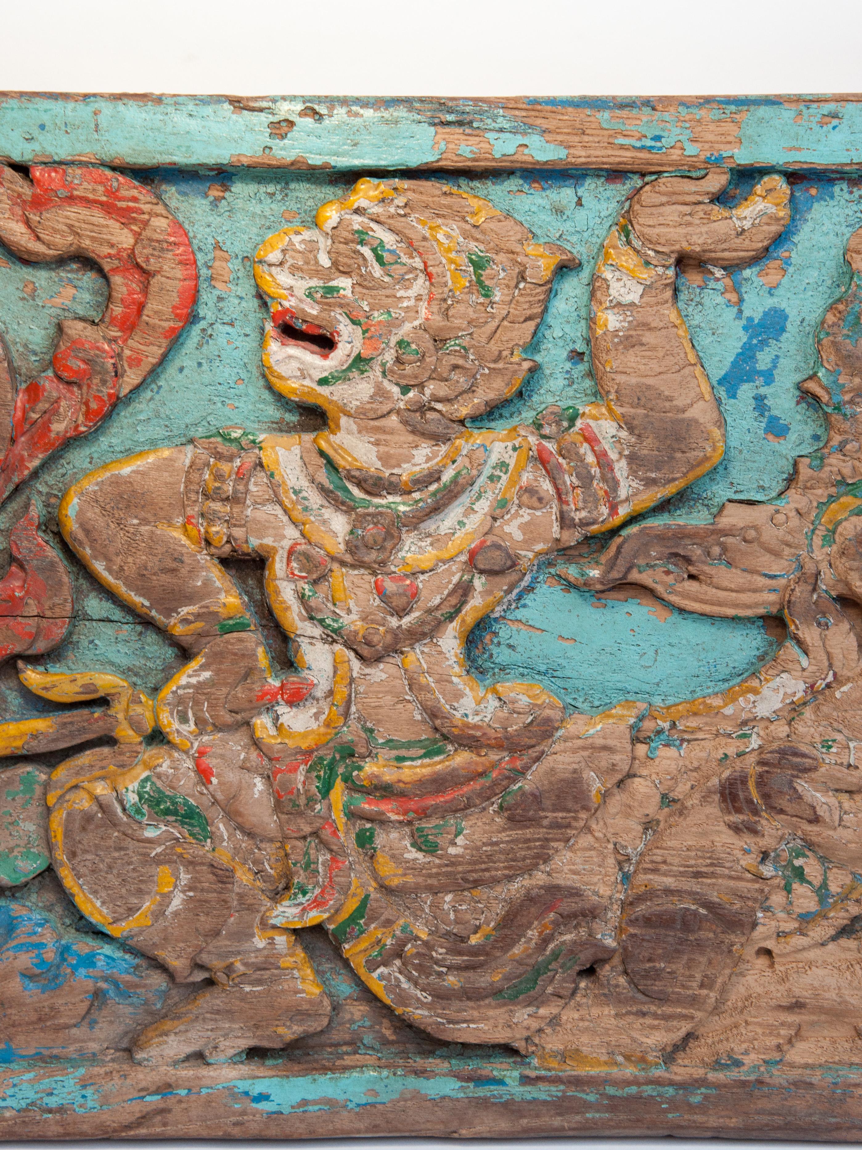 Vintage hand carved Panel from Thailand. Hanuman Motif, mid-20th century. This rustic old house or cart panel from northern Thailand depicts the much beloved character Hanuman, the divine monkey god and hero of the Hindu epic, the Ramayana.