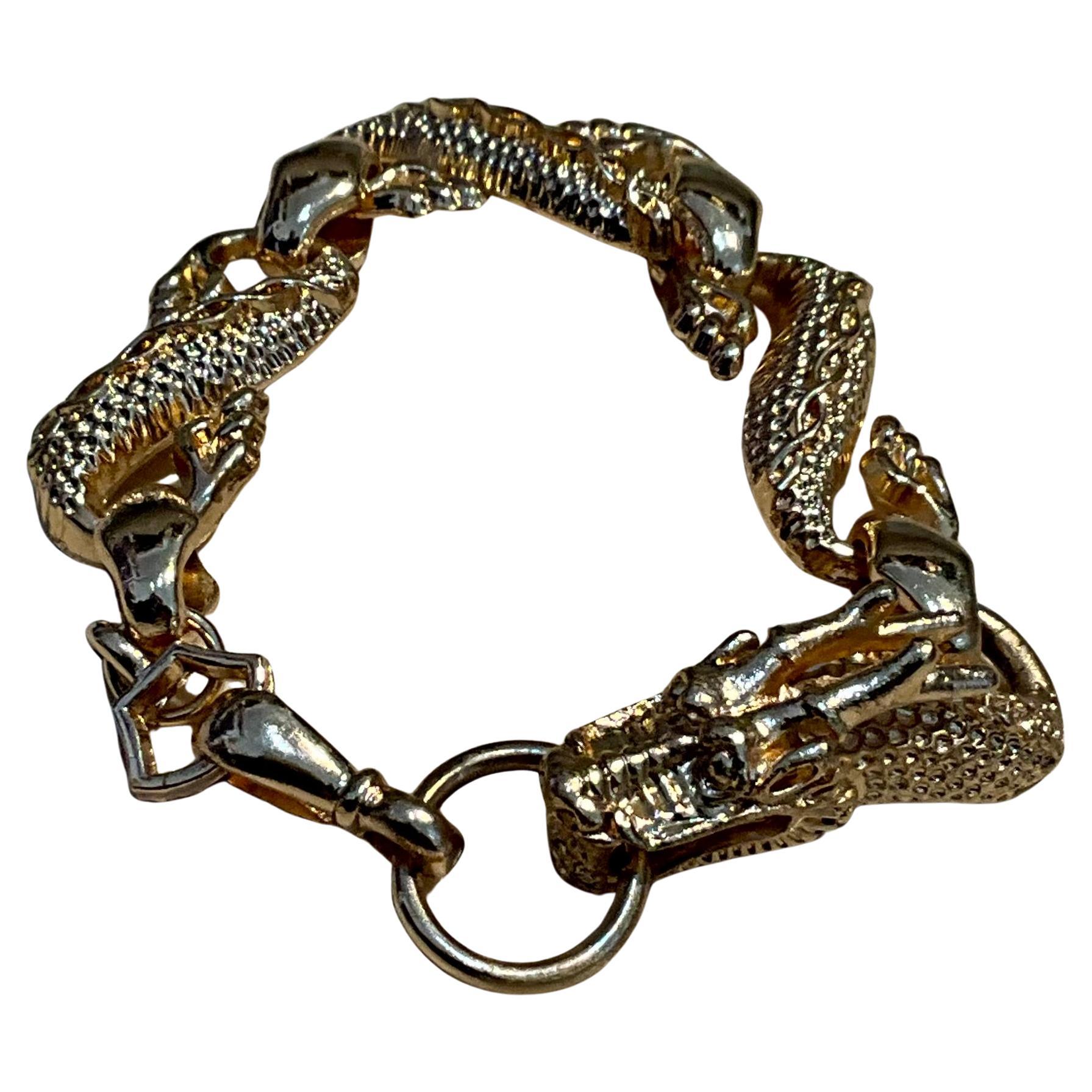 This Vintage Hand-Carved Rose Gold Dragon Bracelet is an exquisite and unique piece of jewelry that combines artistry, craftsmanship, and cultural symbolism.

 The dragon is a powerful symbol in many cultures, particularly in Chinese and Asian art.