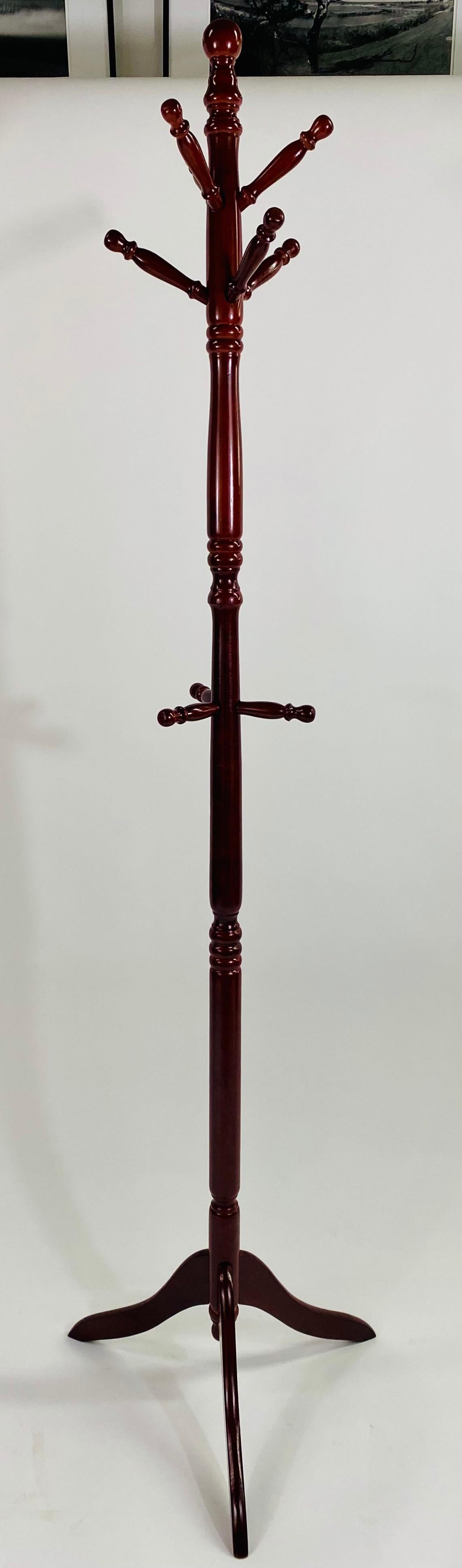 A classy and quality Coat rack or stand. The piece is beautifully hand-carved of quality rosewood and is hand-carved showing fine details. The elegant yet simplistic style of the coat rack can an addition to any home or office style. 

Dimensions