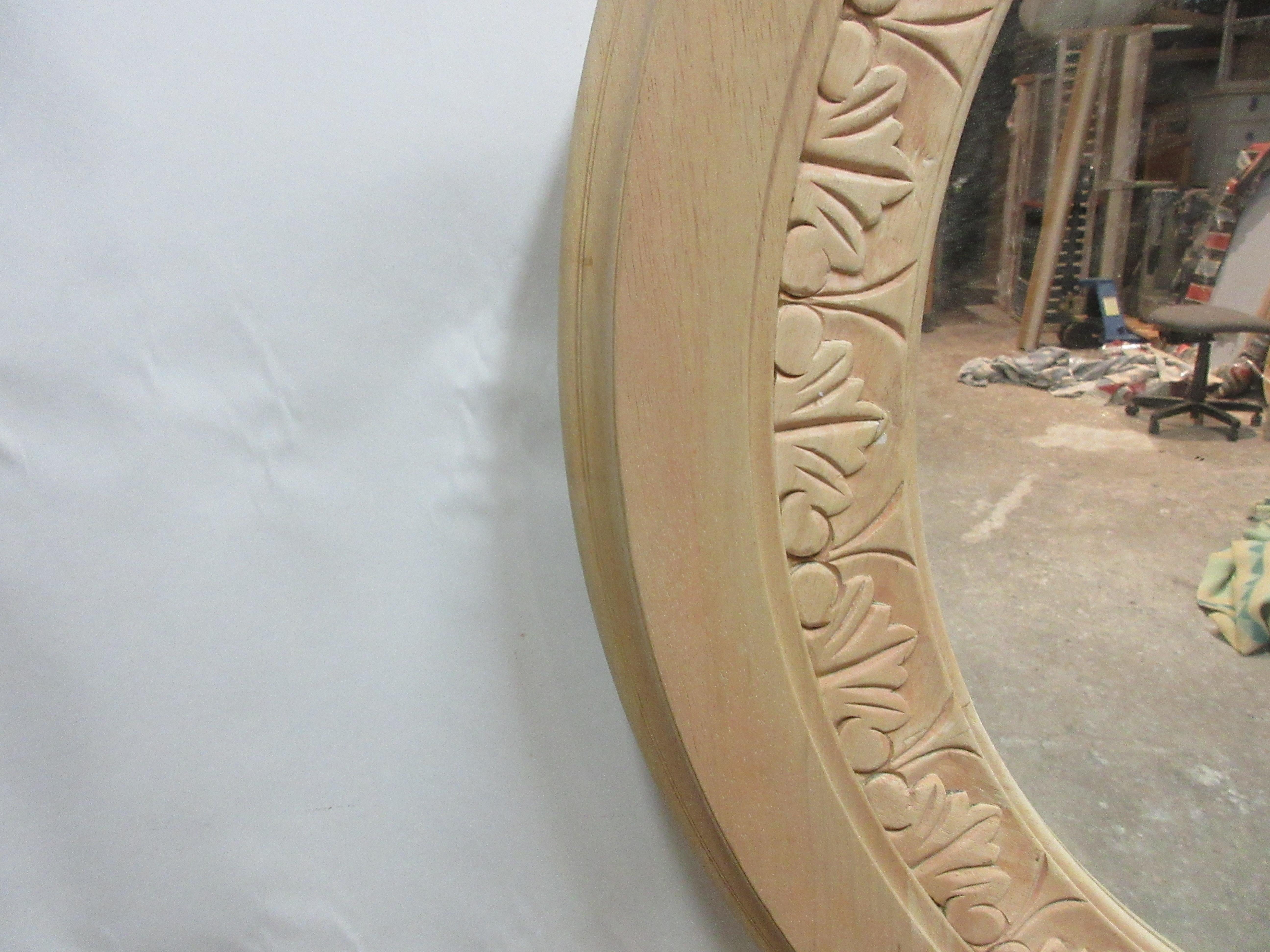 This is a unique Vintage Hand Carved Round Mirror. it had a dark brown paint on it and I thought it would look much better stripped to Raw wood.