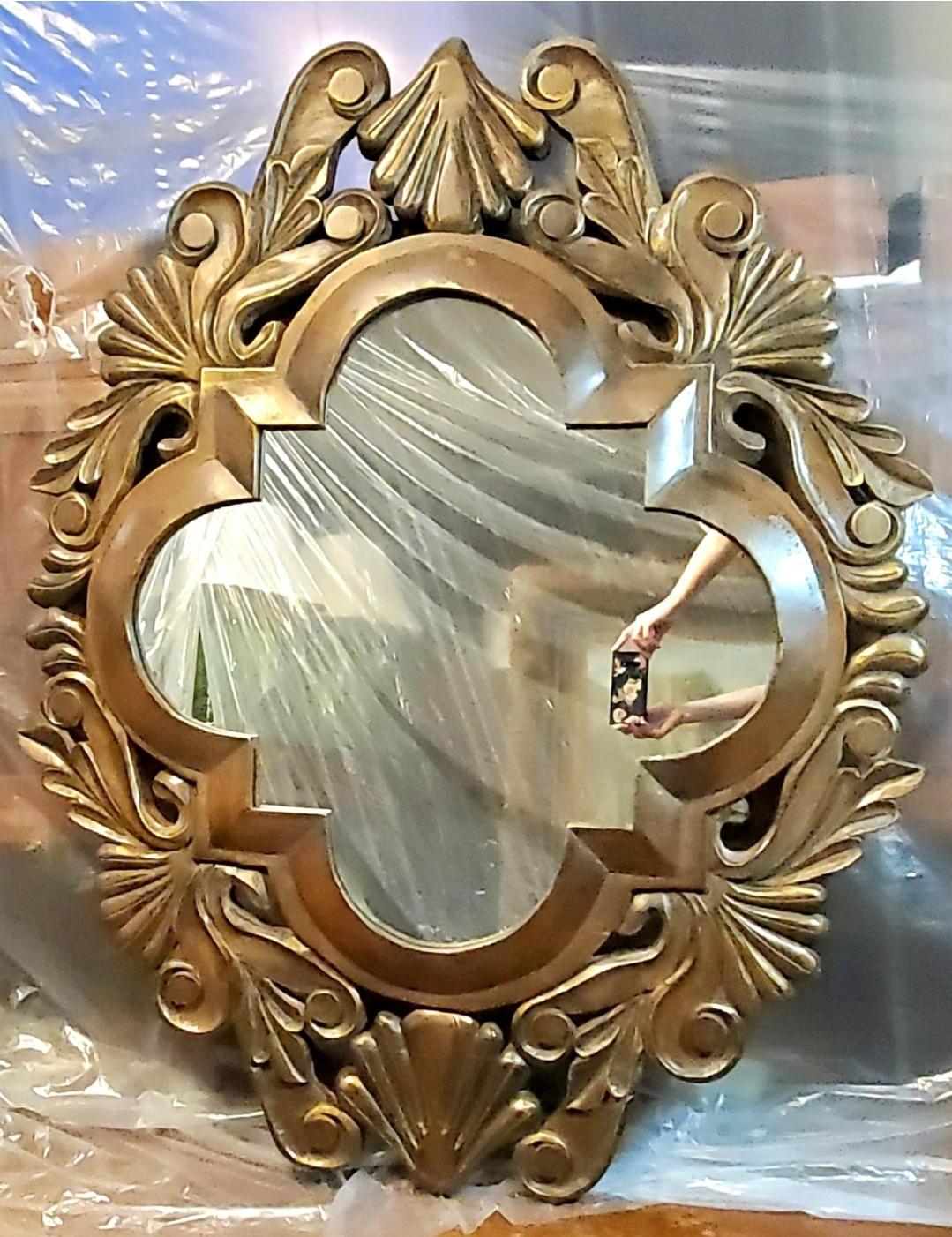 Post modern.
Striking.
Looks different from different angles.
Vintage 30-40 year old hand carved, solid mahogany mirror.
Silver dusted finish.
Shell carvings.
Hollywood regency.
Art deco. less

